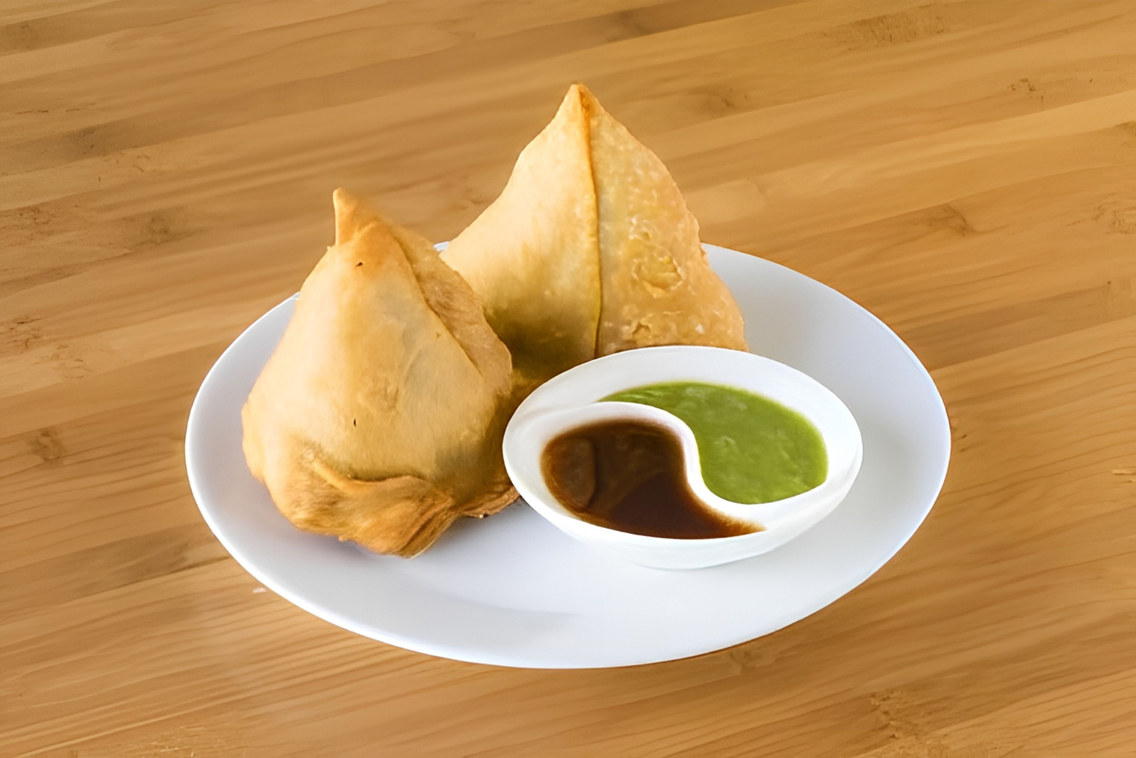 Veg Samosas (2 pcs).