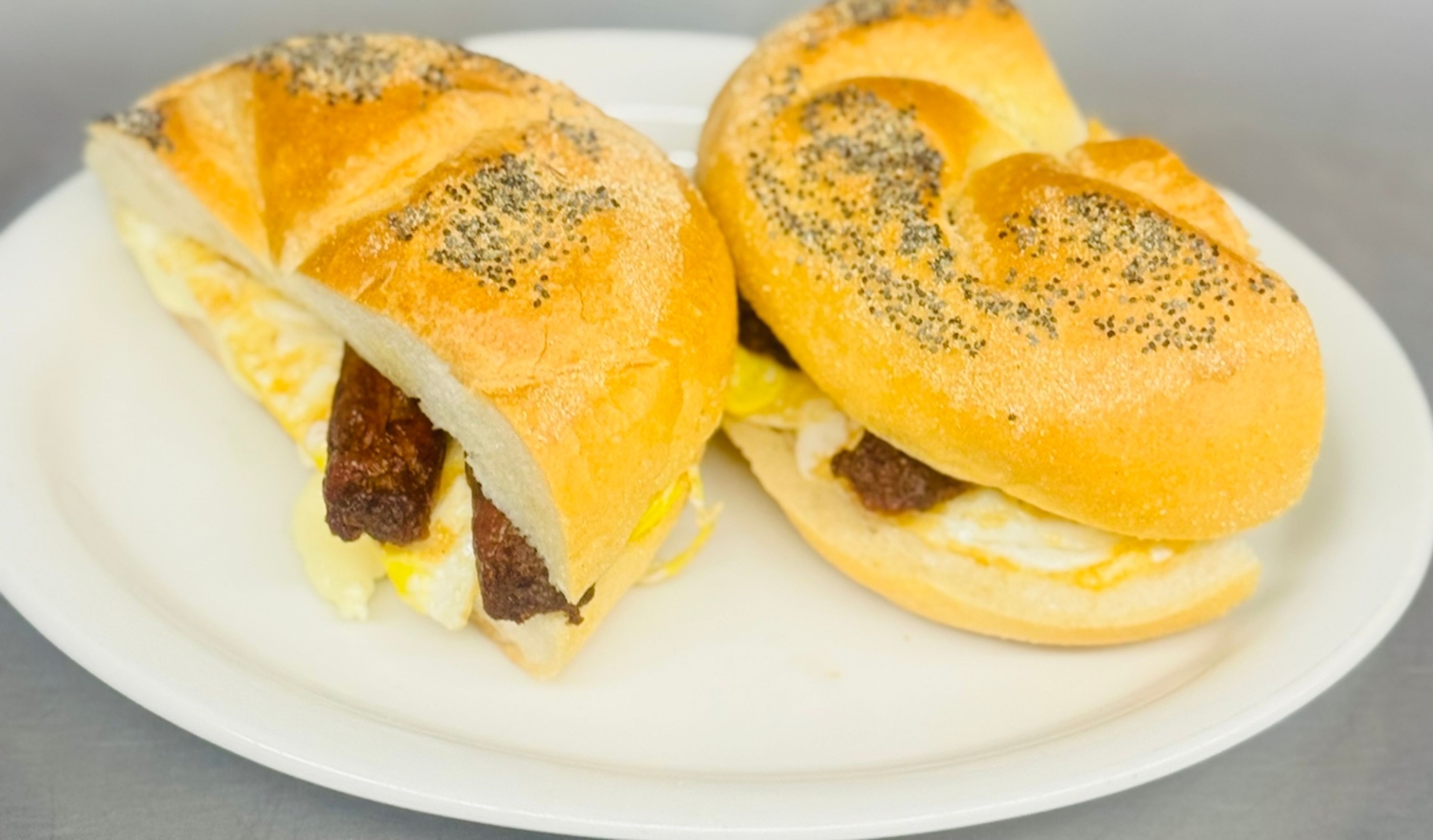 Sausage & Egg Hard Roll.