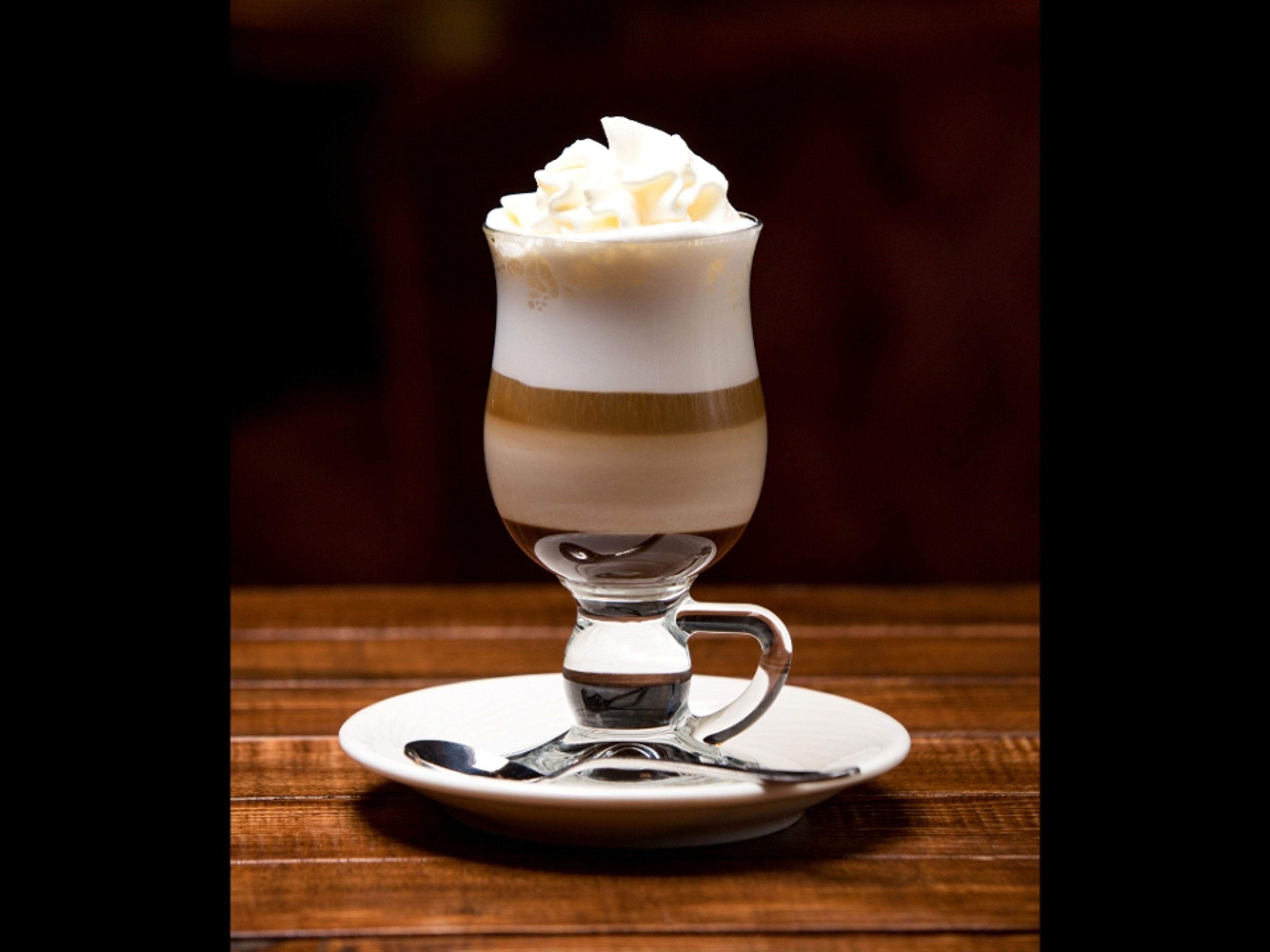Macchiato (Traditional - 4 oz topped with foam)*.