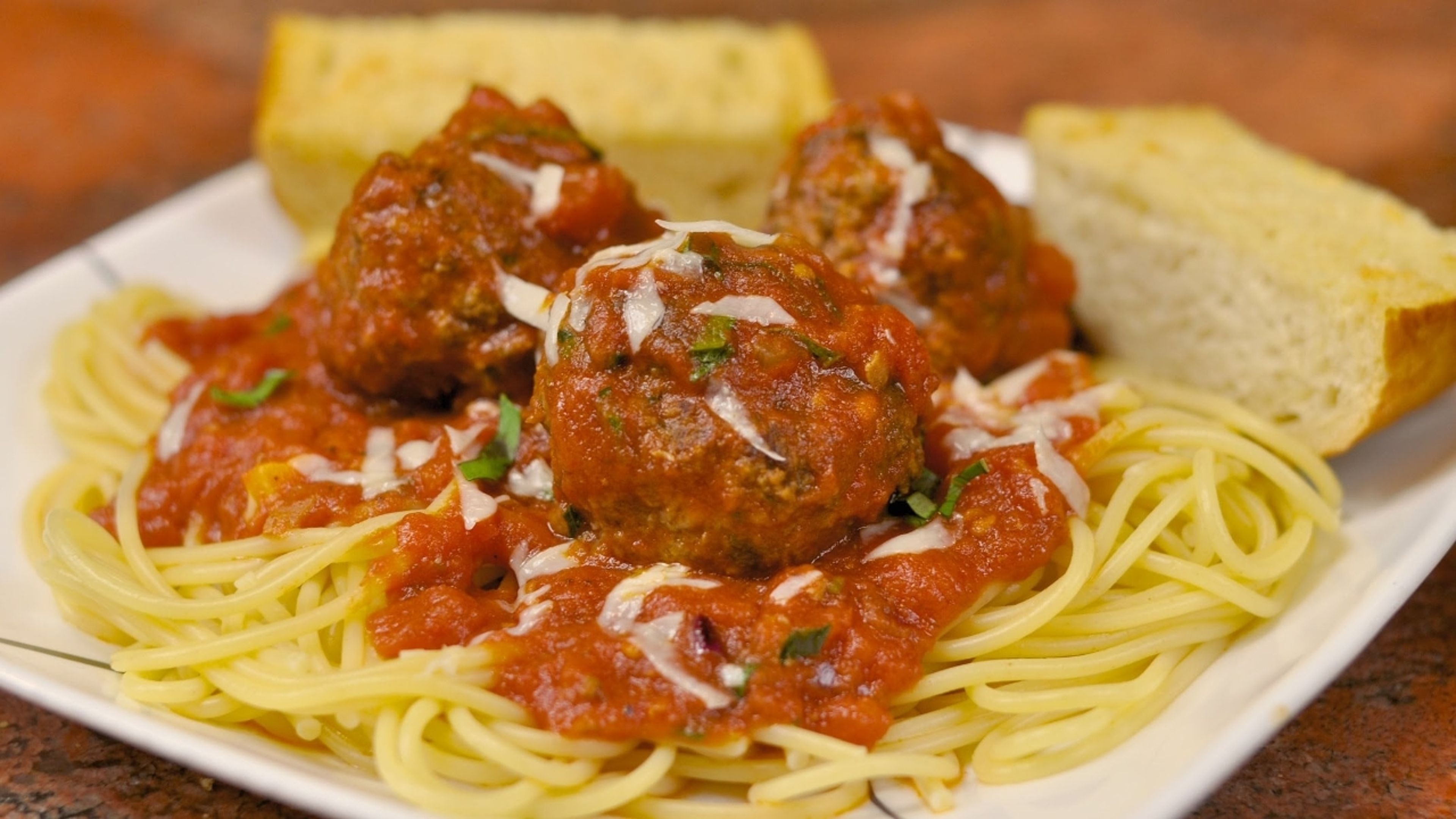 Spaghetti with Meatball OR Sausage & Garlic Bread.