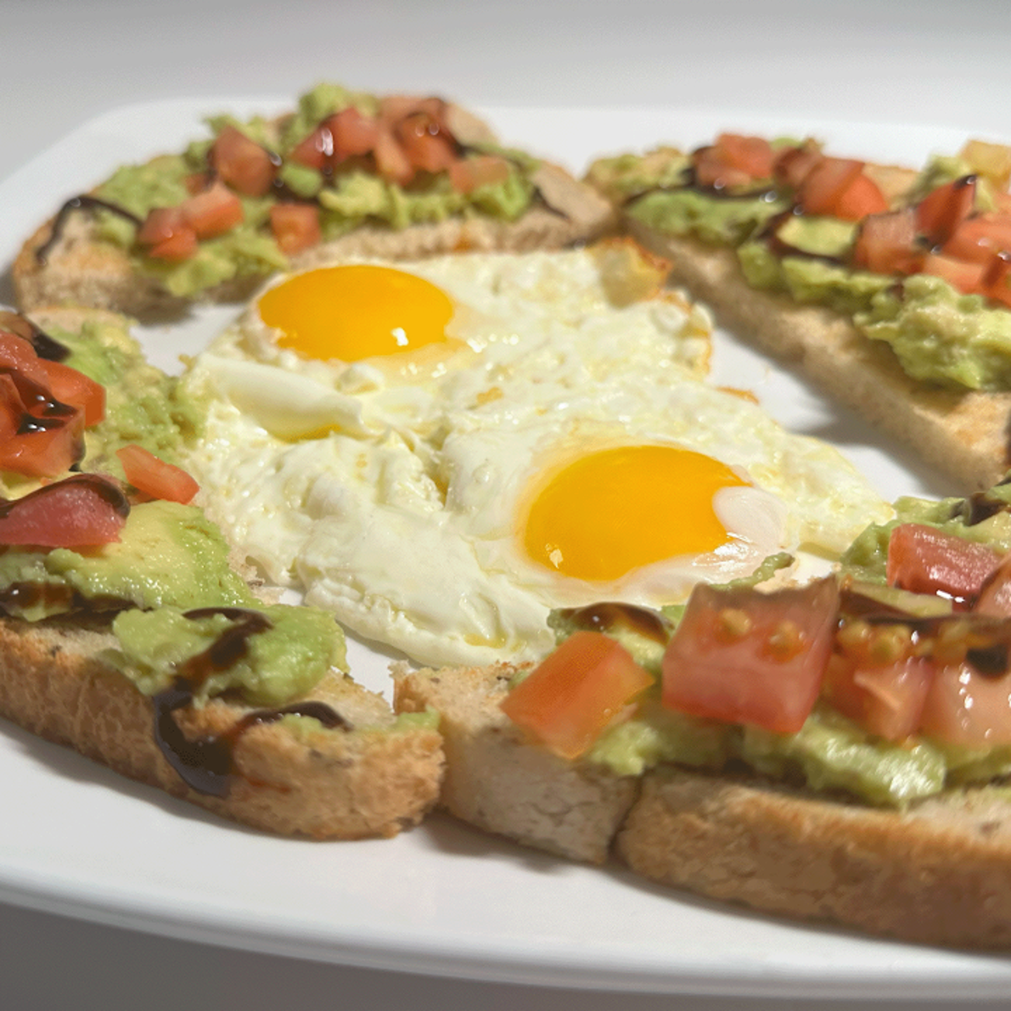 AVOCADO TOAST AND 2 EGGS.