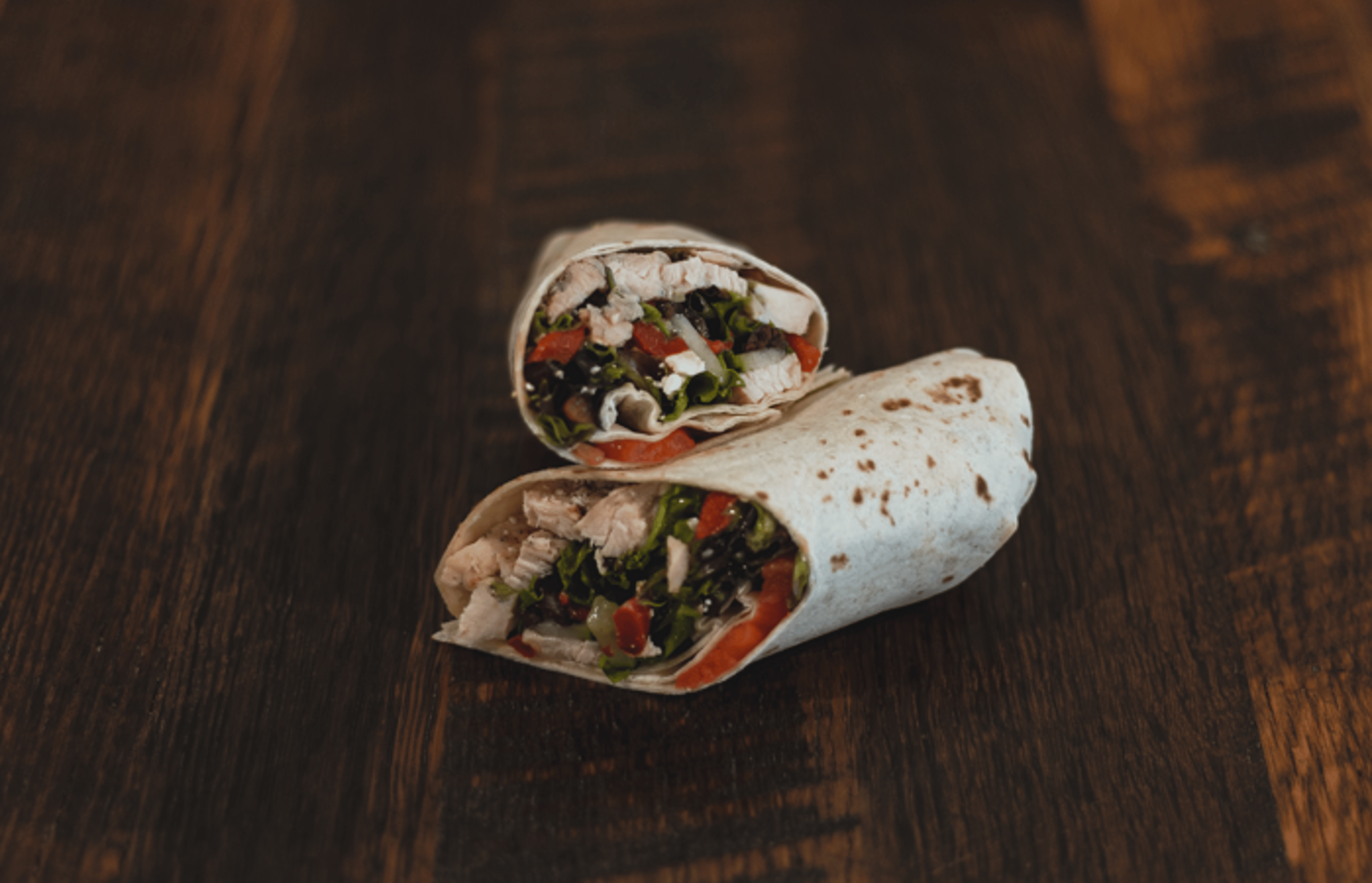 MEDITERRANEAN CHICKEN WRAP.