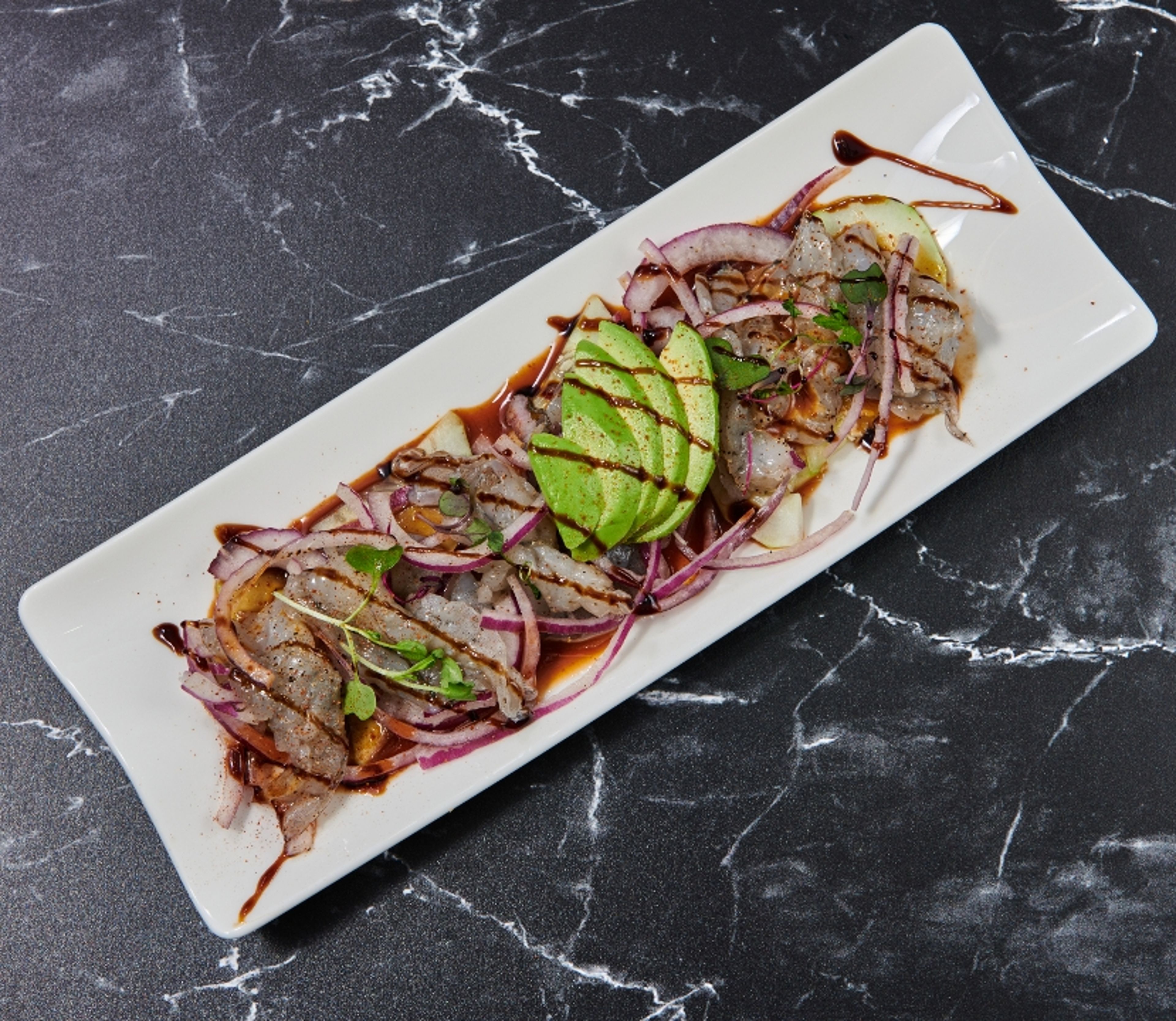 Tostada Aguachile Roja.