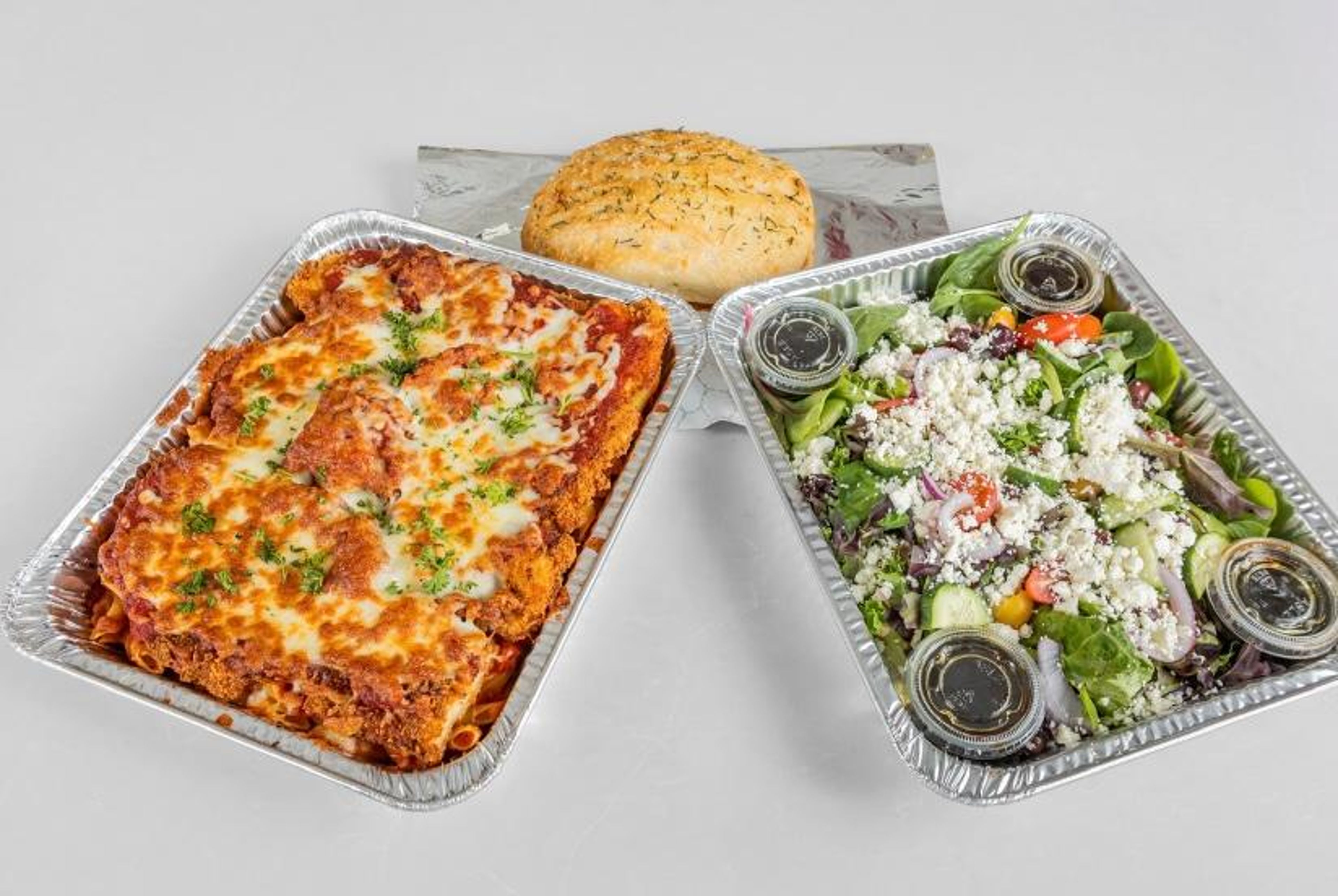 Family Pollo alla Parmigiana Over Baked Ziti+ Focaccia + Family Salad.