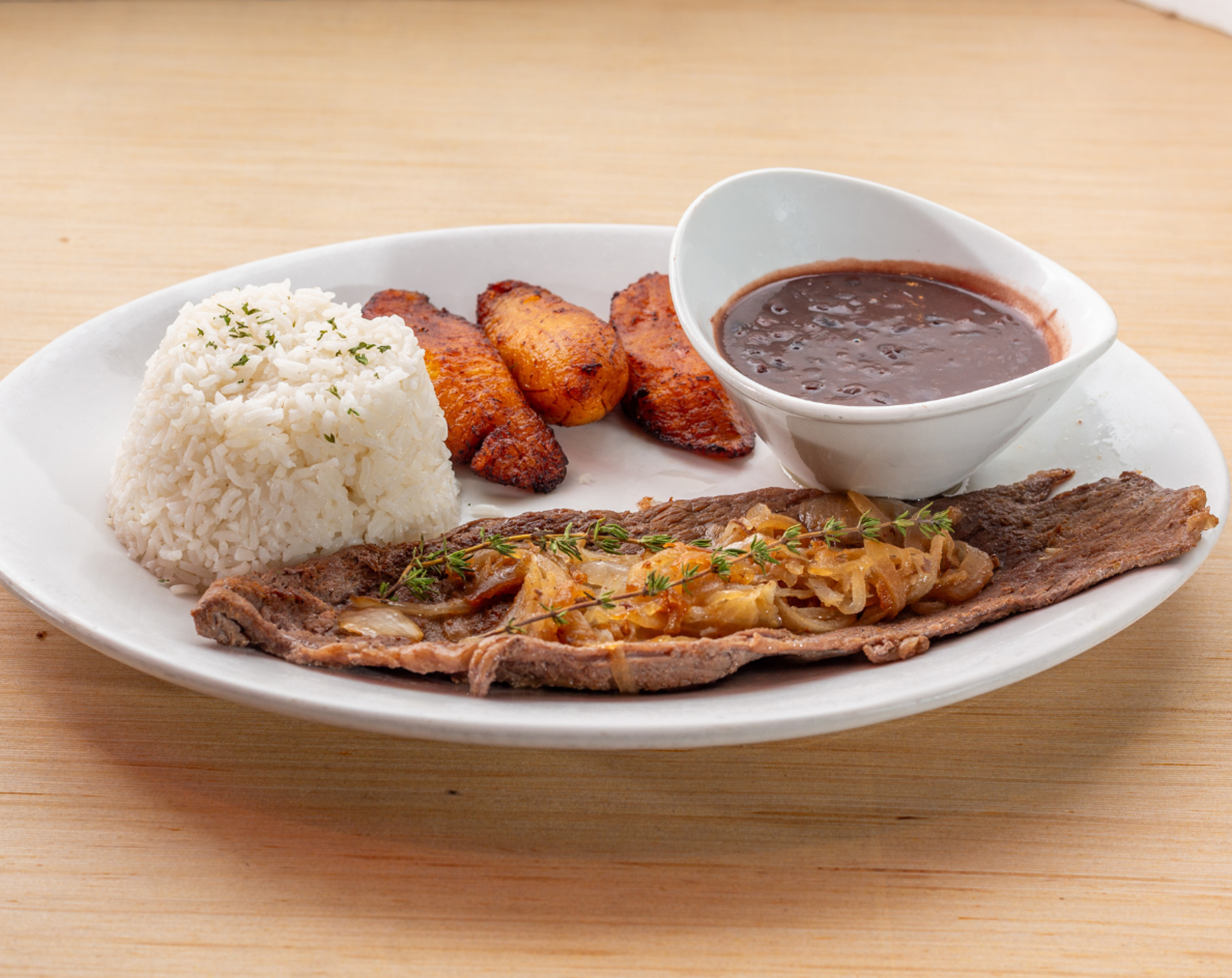 Bistec De Palomilla.