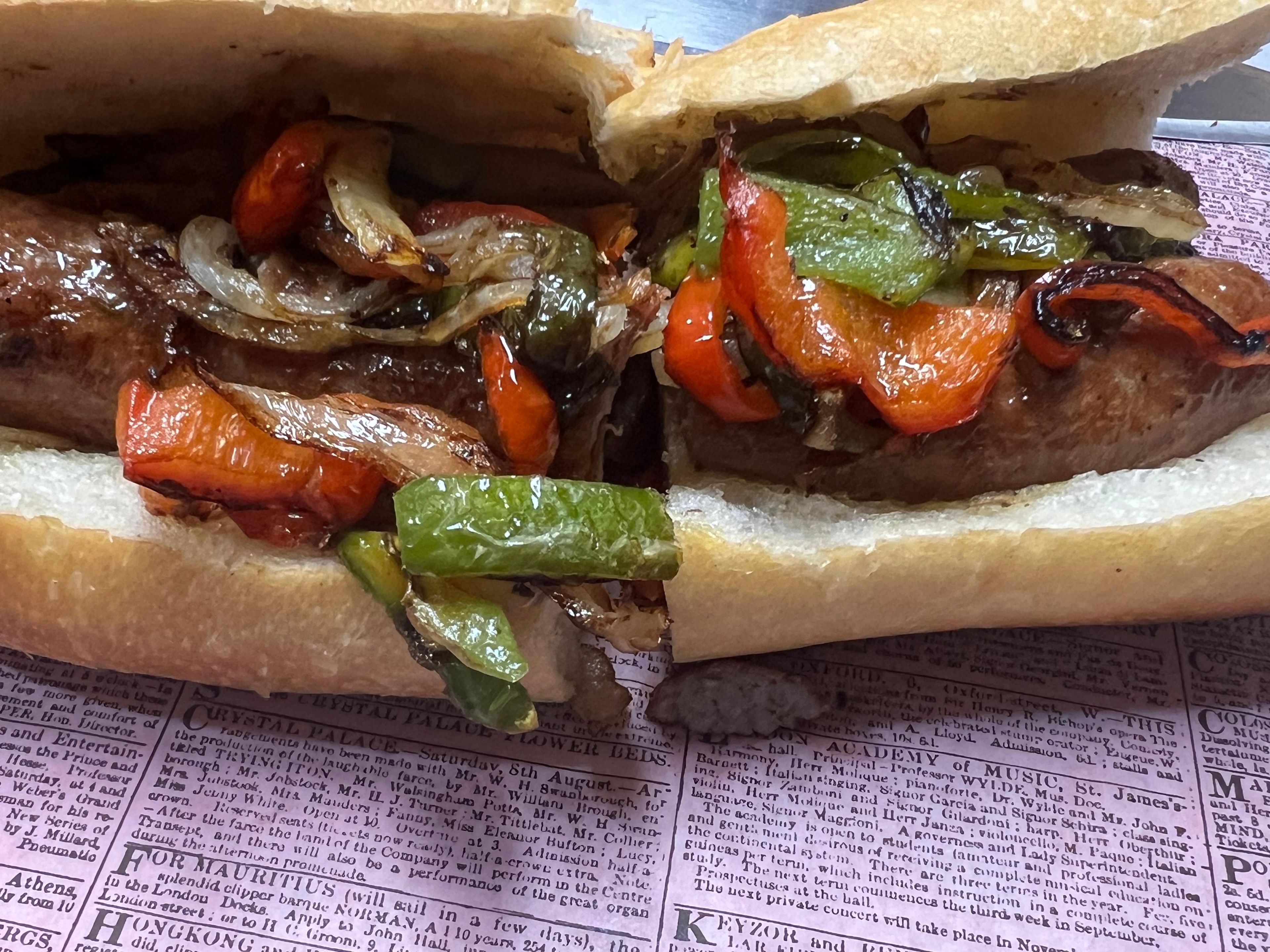 Grilled Sausage Sub with fries.