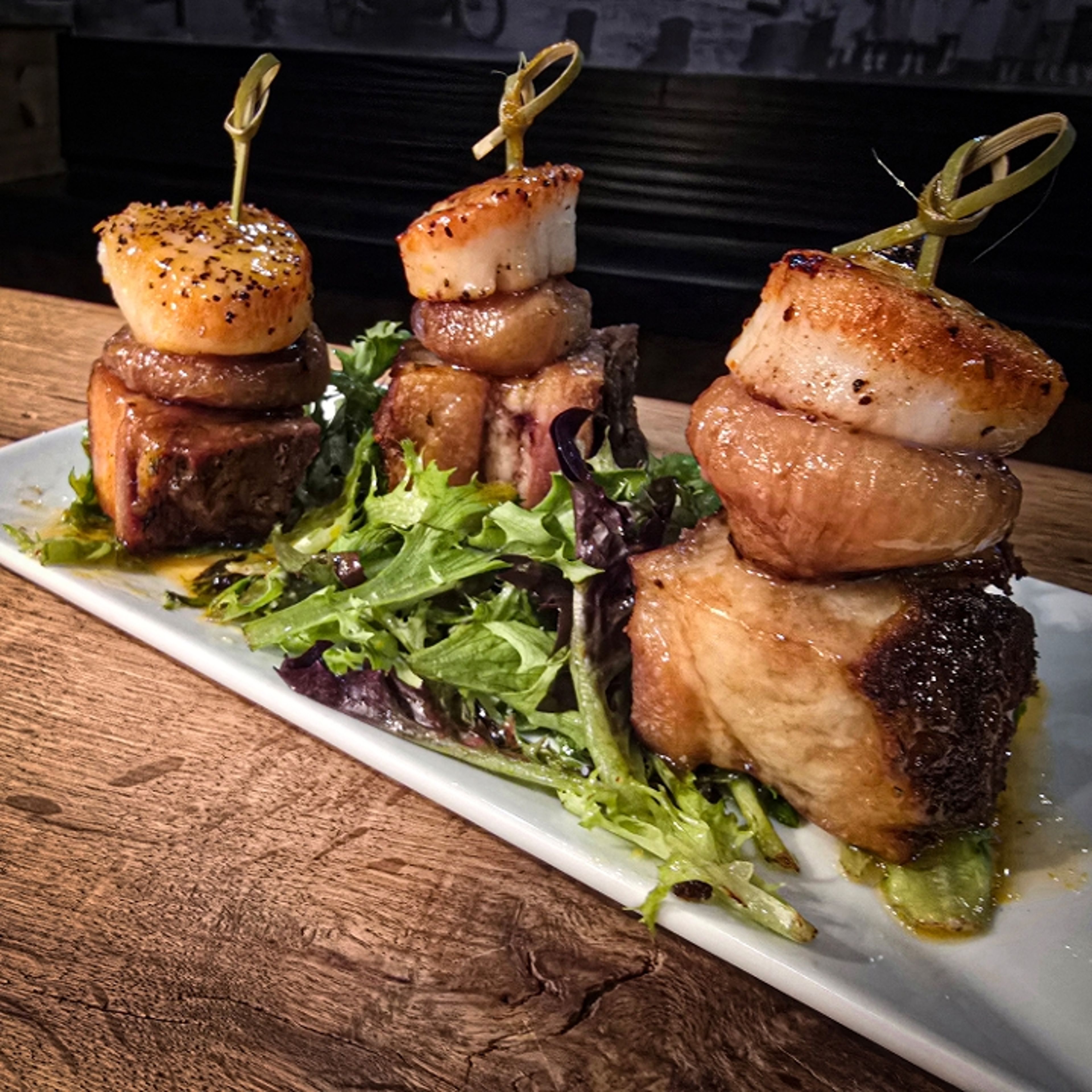 Pork Belly & Scallop Lollipops.