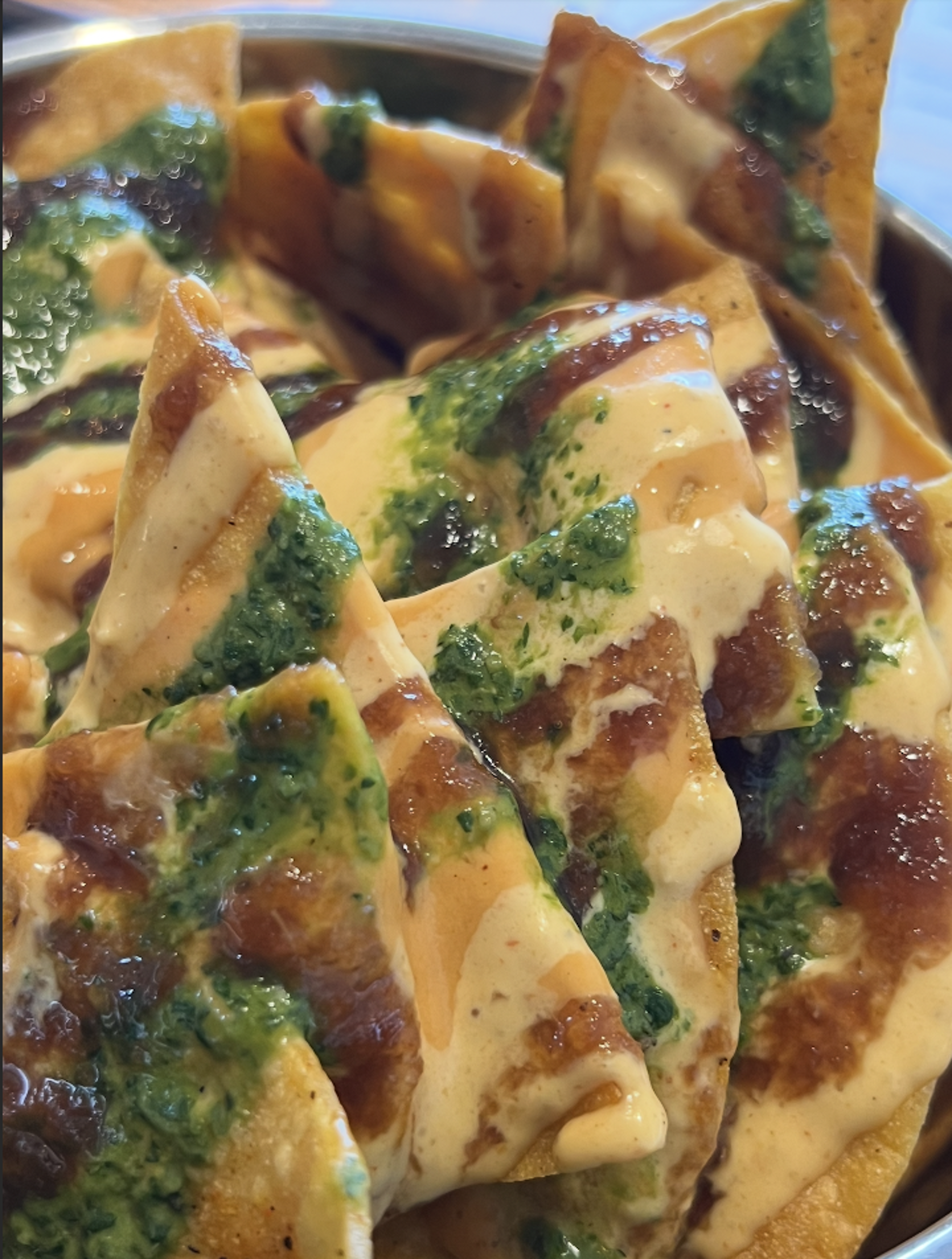 Masala Queso Nachos.