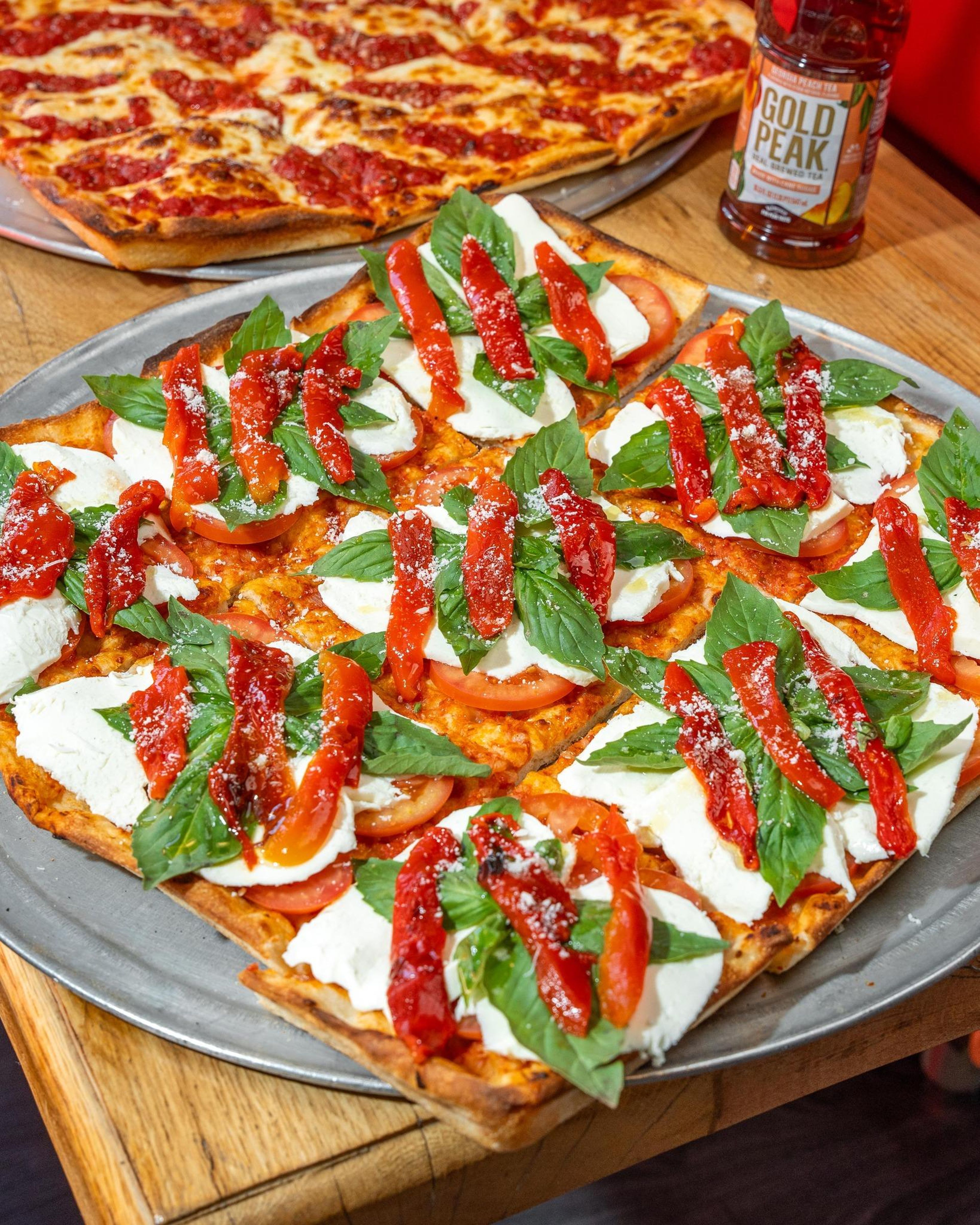 Fresh Mozzarella, Tomato, Basil & Roasted Peppers Pie.