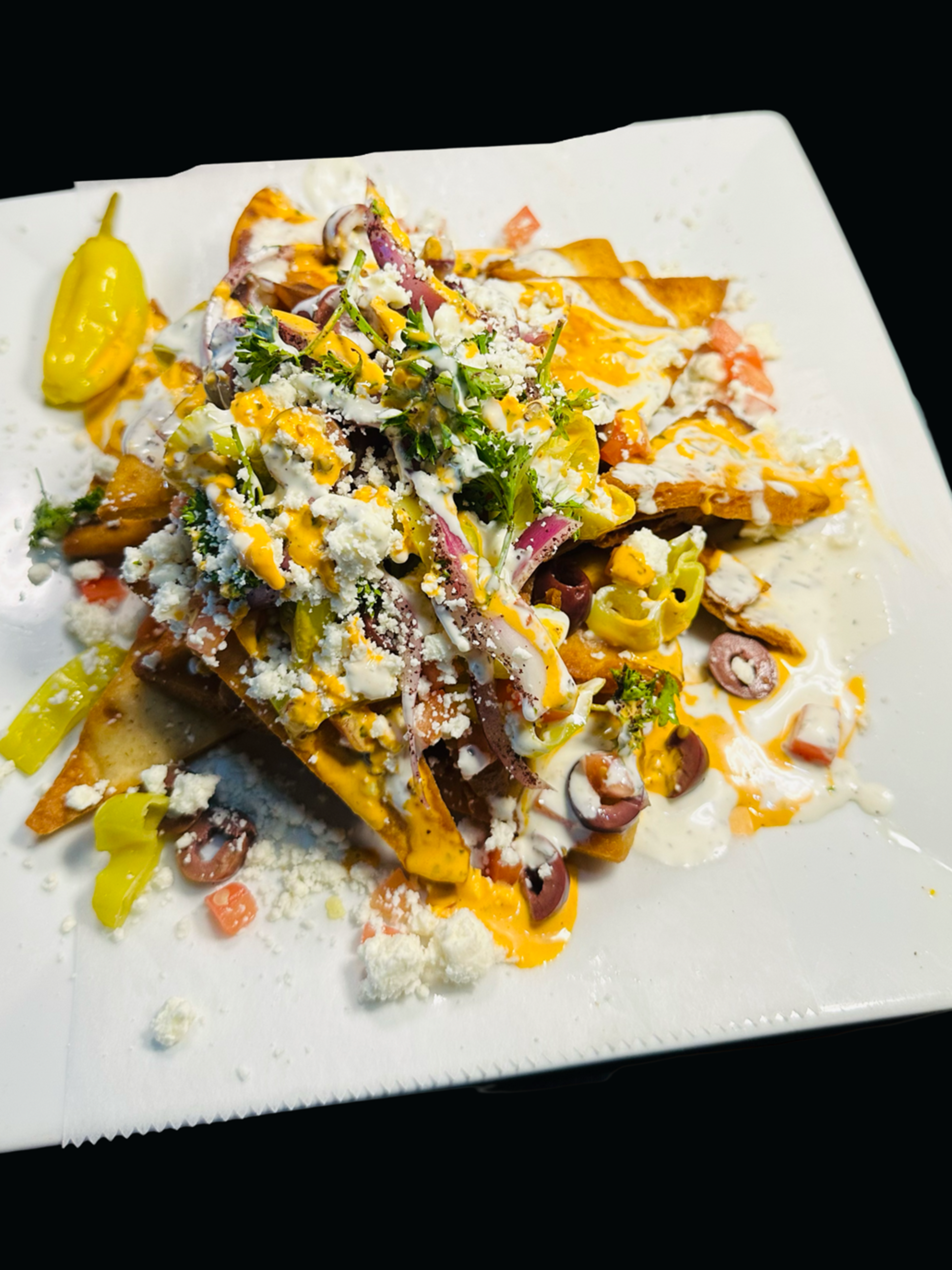 GREEK NACHOS.
