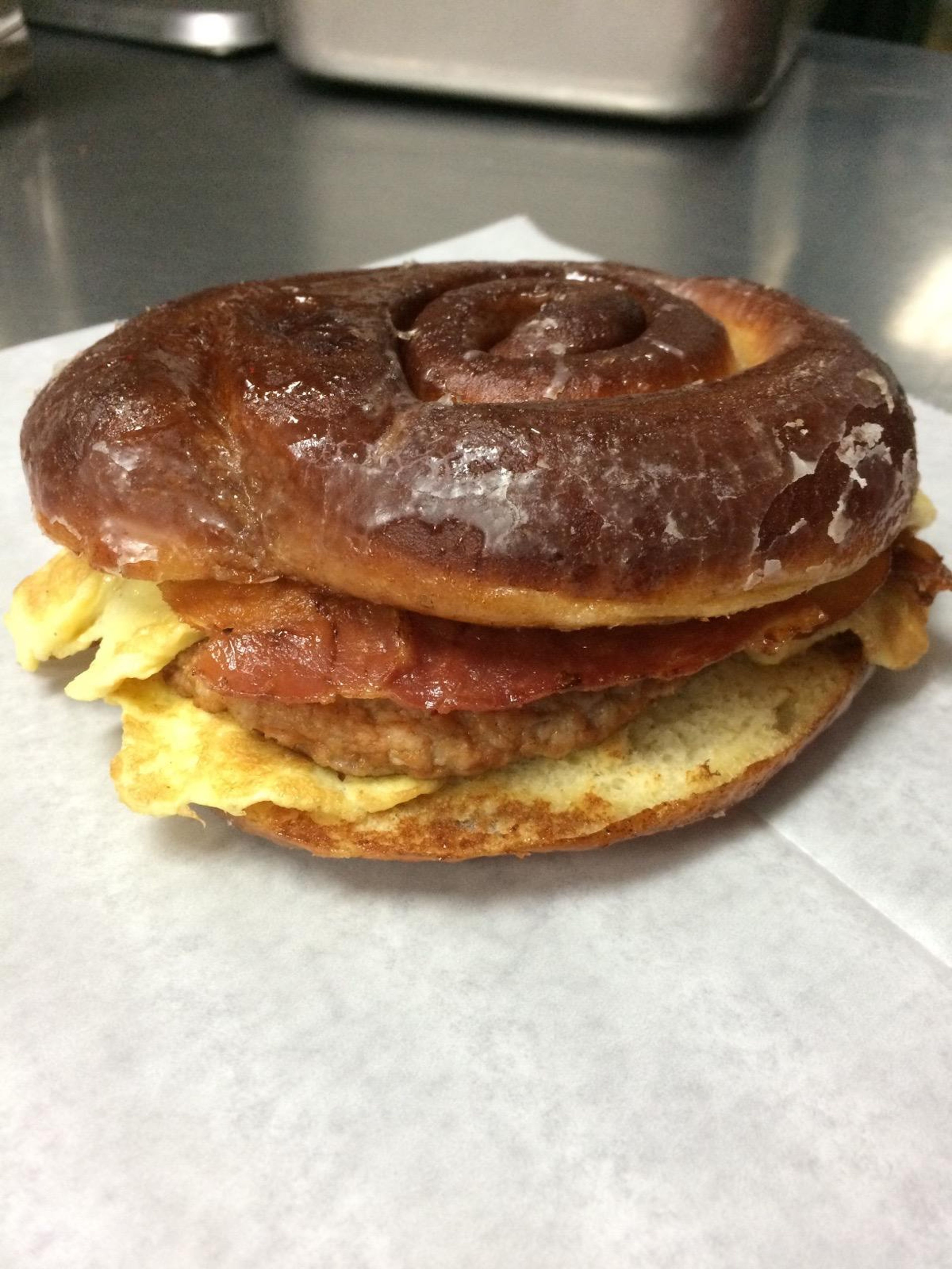 Cinnamon Roll Sandwich: Bacon, Egg, Sausage, & Cheese.