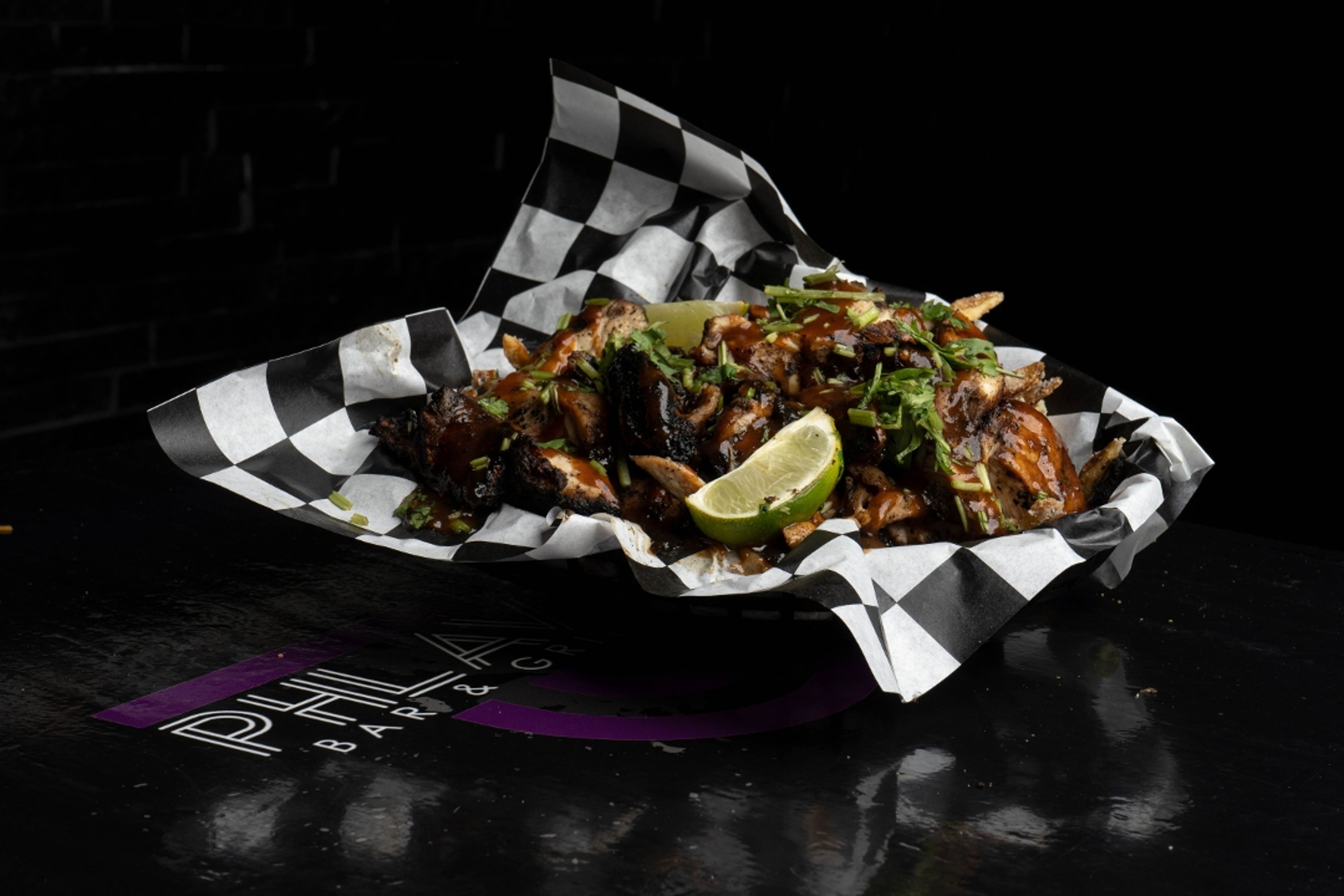 Jerk Chicken Tips w Friez.