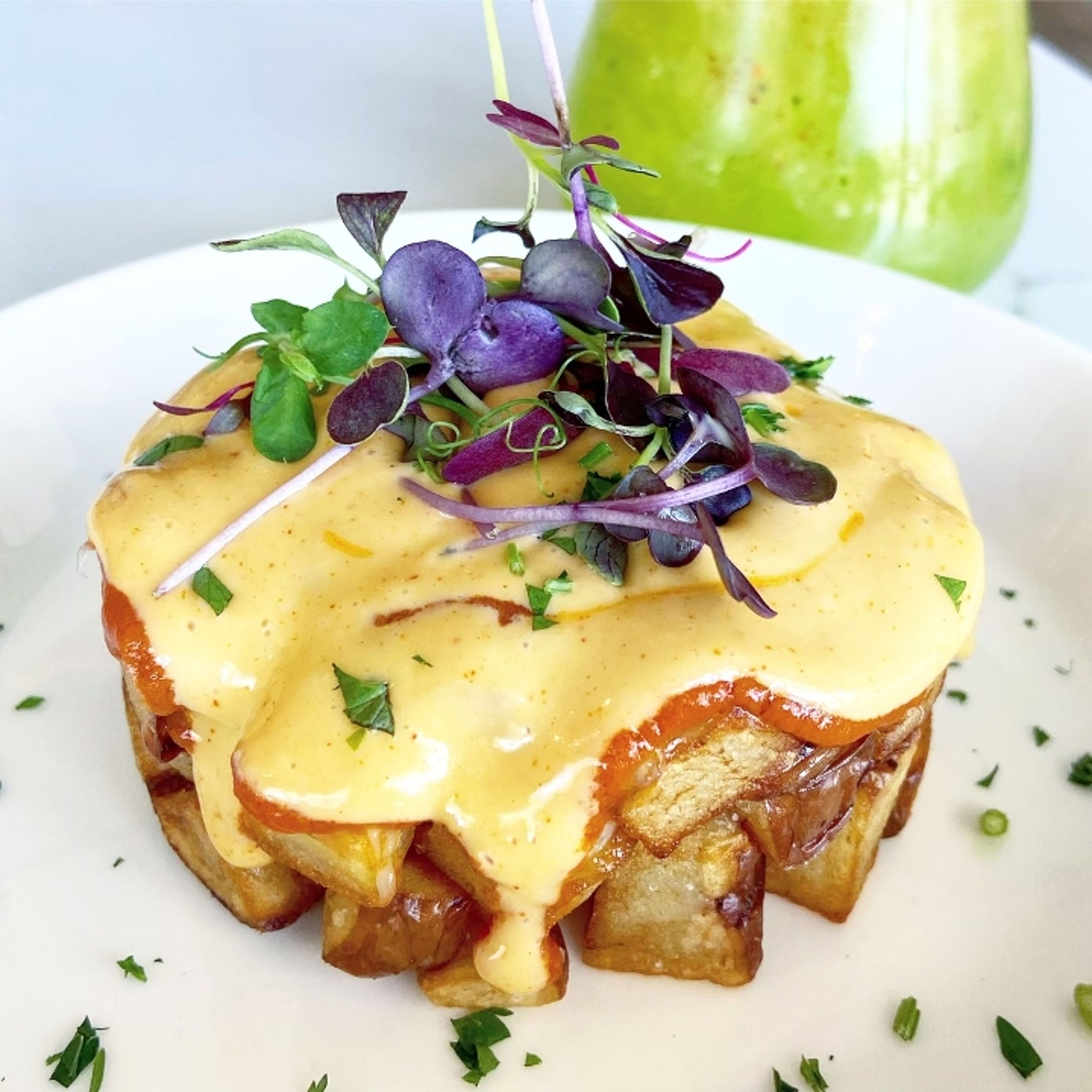 Patatas Bravas Con Manchego.