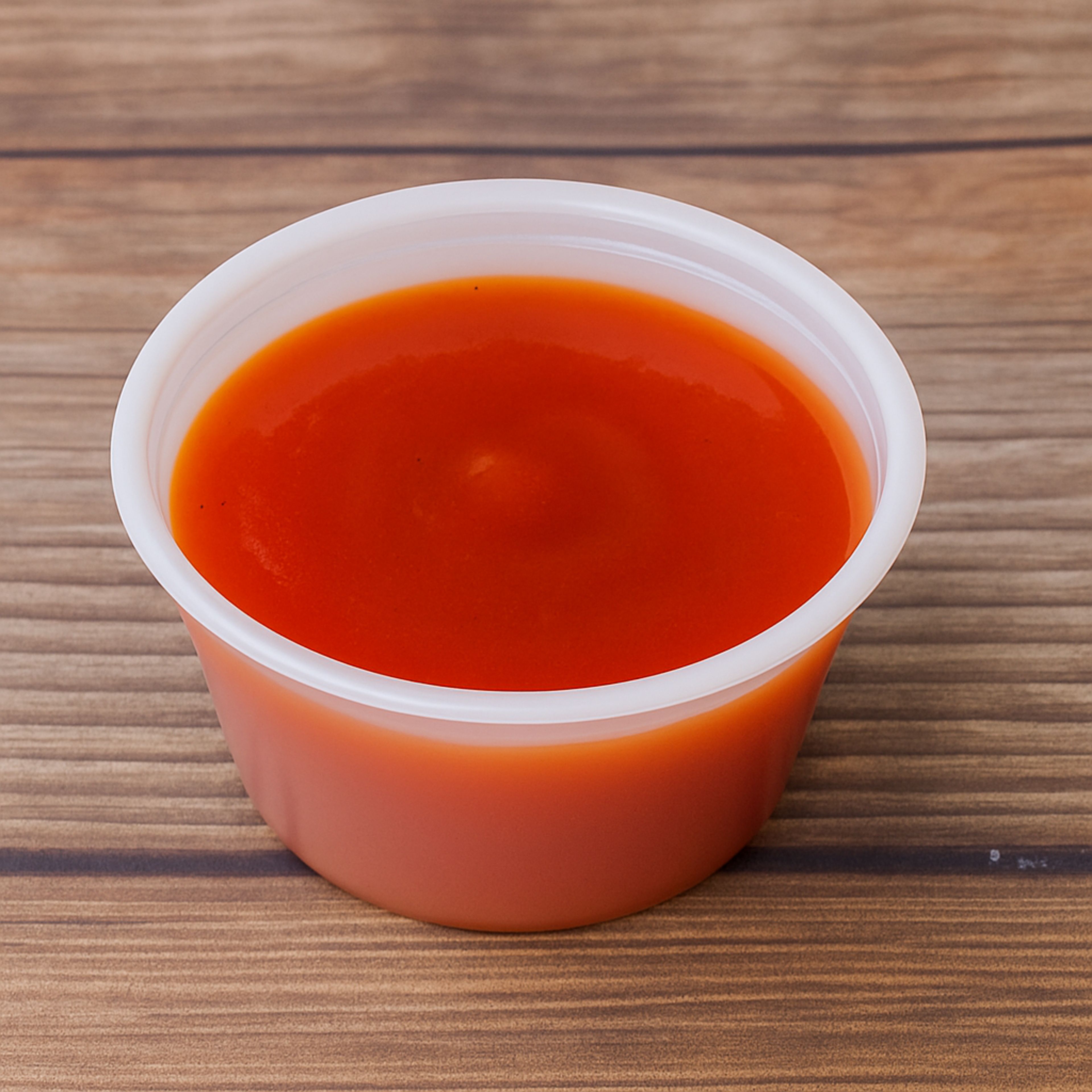 Cup of Hot Sauce.