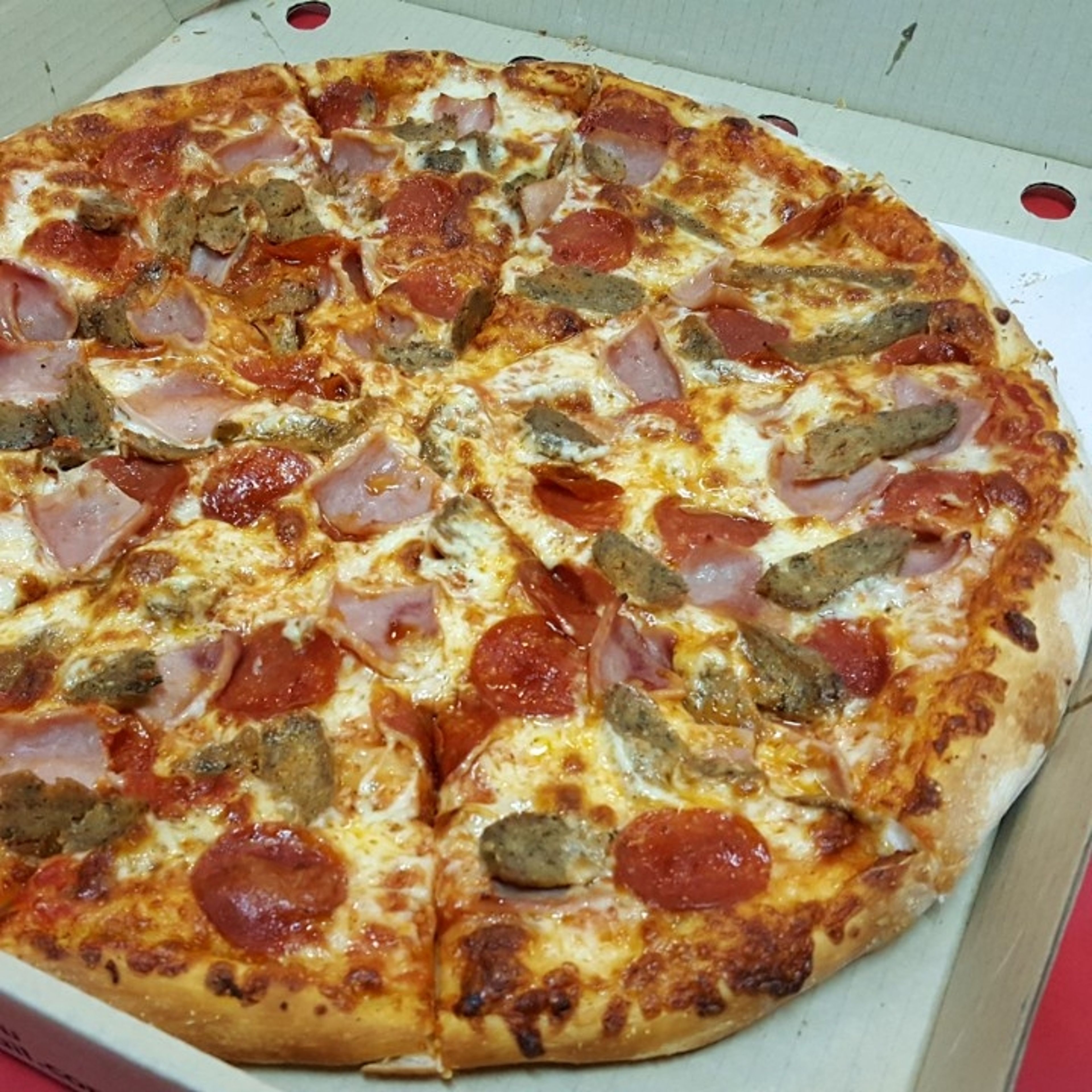 10''  Quatro Carne Pizza.