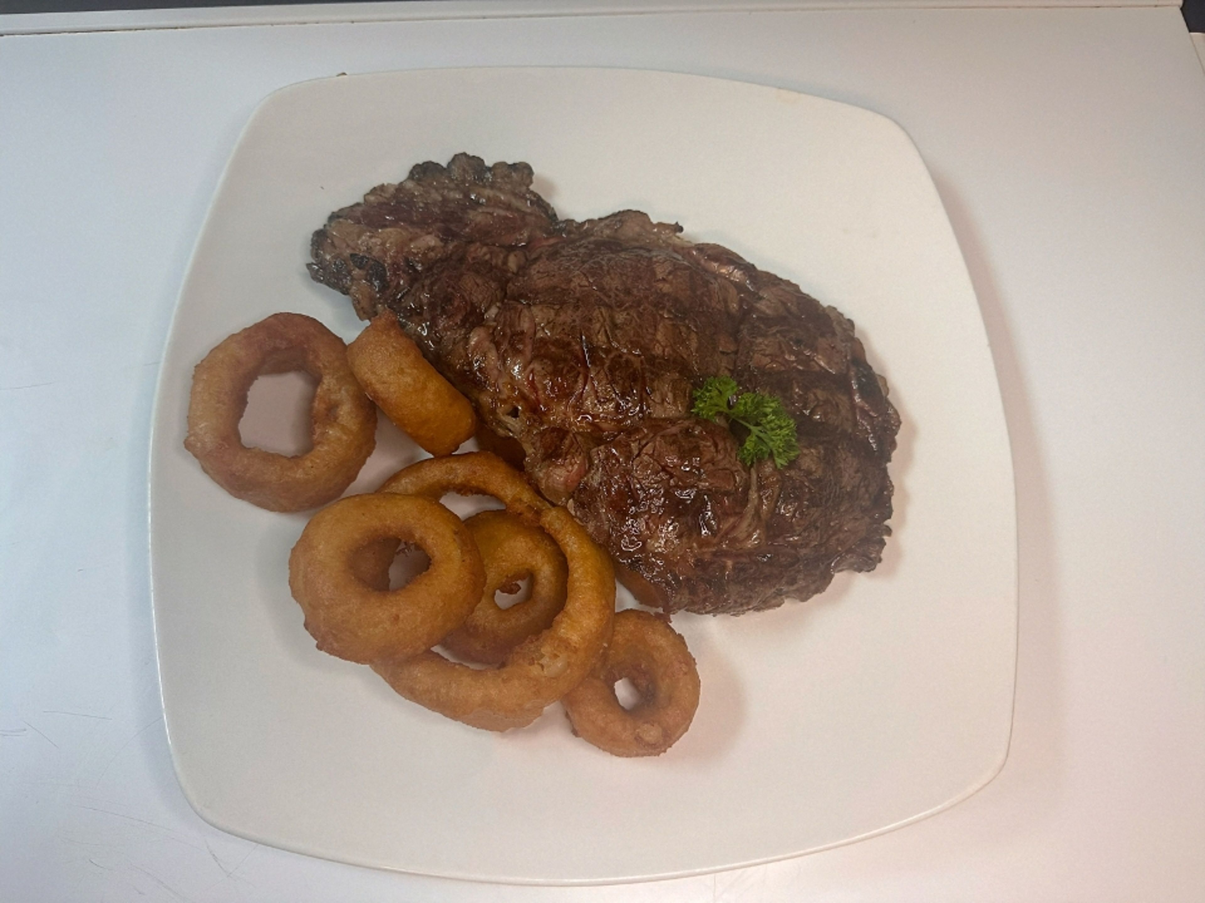 14 Oz USDA Choice Boneless Ribeye.