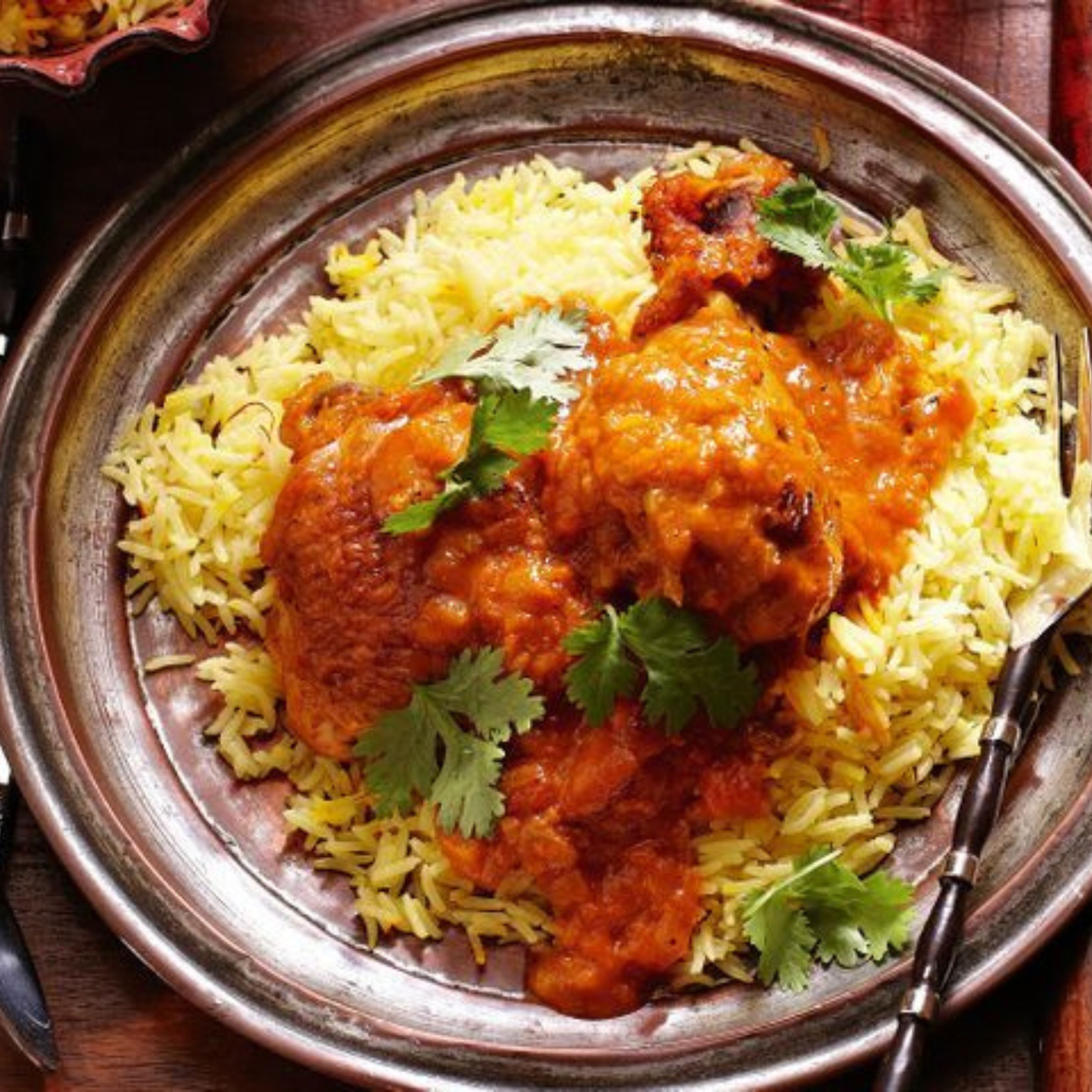 Combo: Chicken Butter Masala with Saffron Rice Pilaf.
