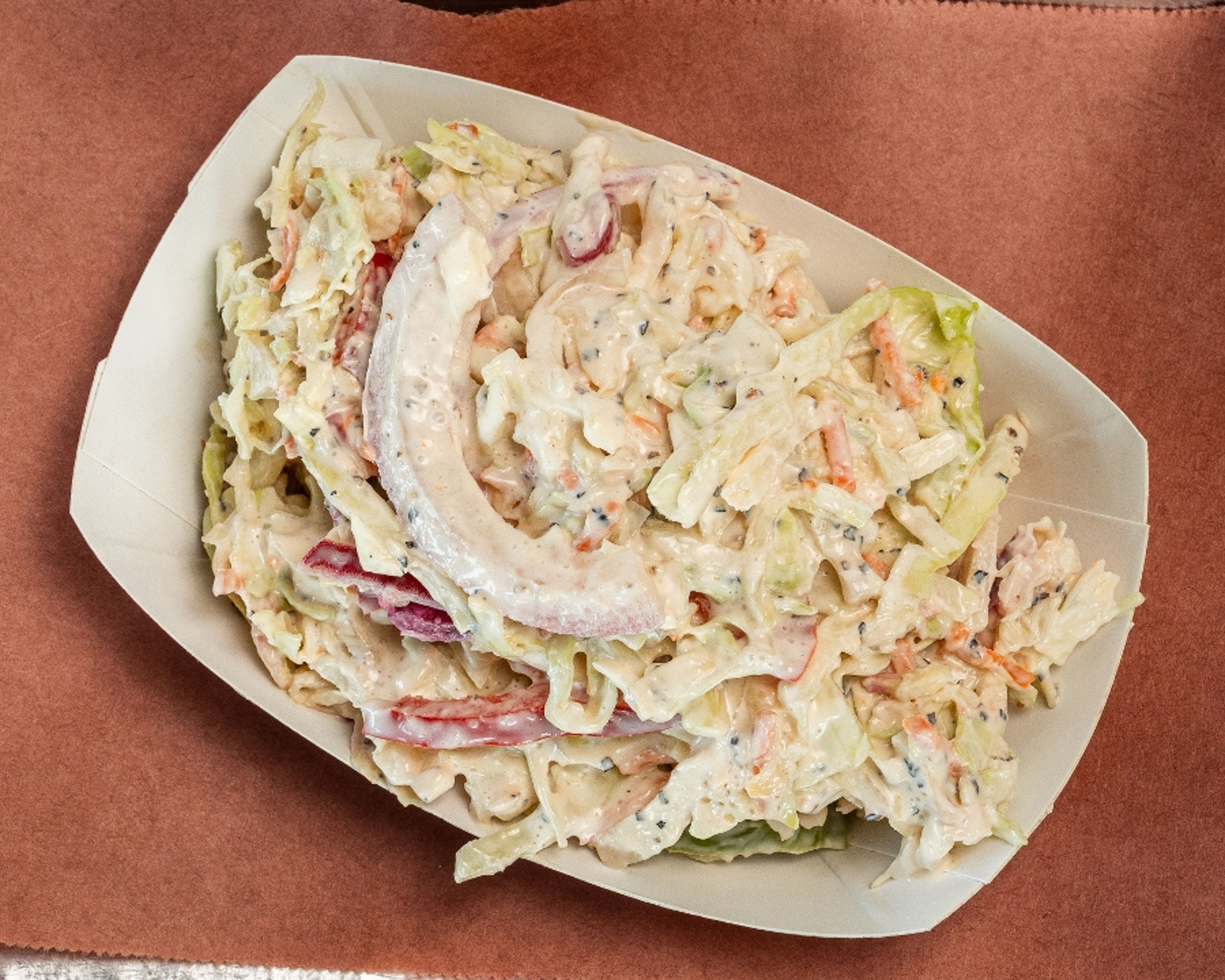 HORSERADISH INFUSED COLESLAW.