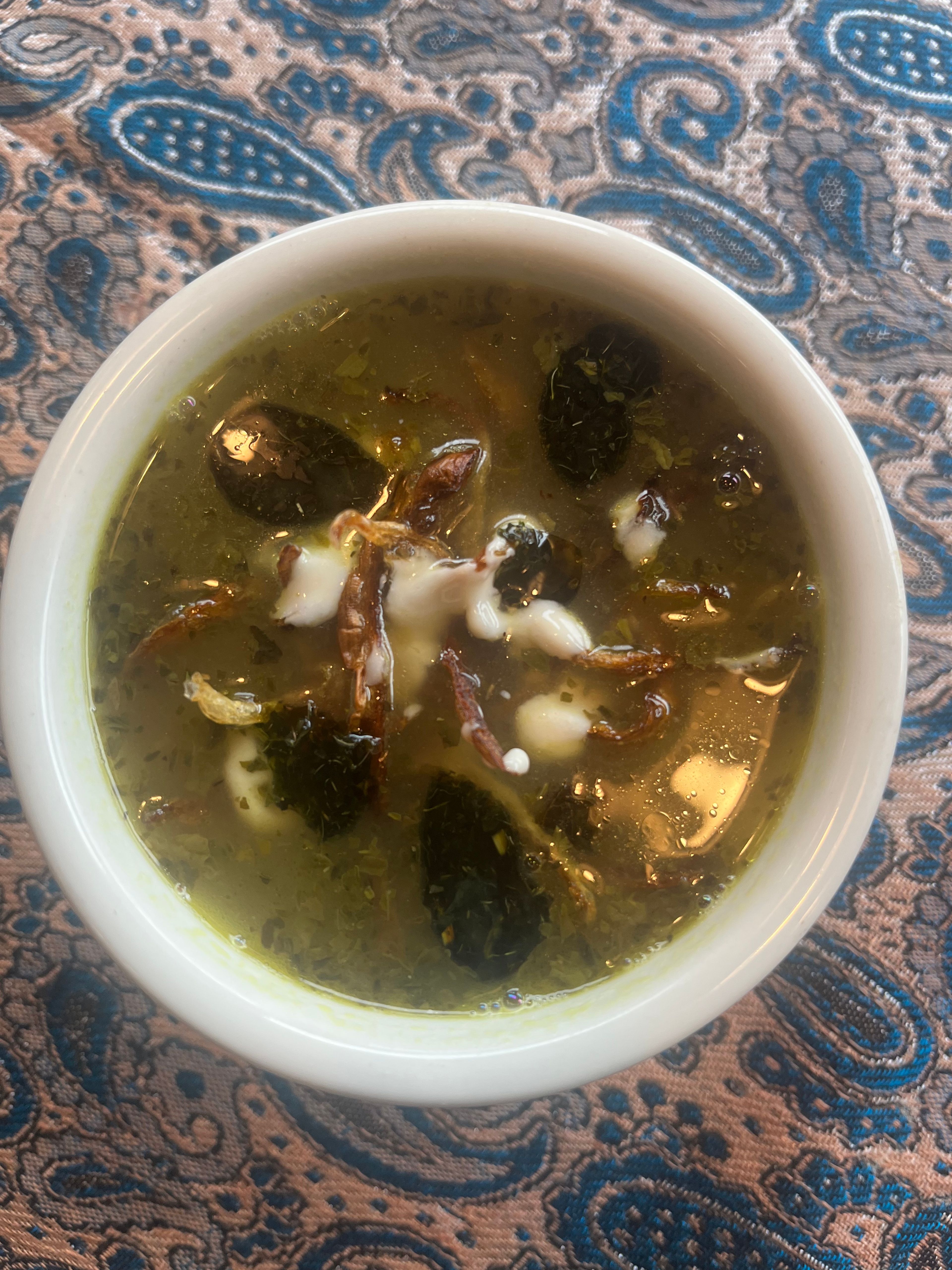 Ash Adas (Herb soup with lentil).