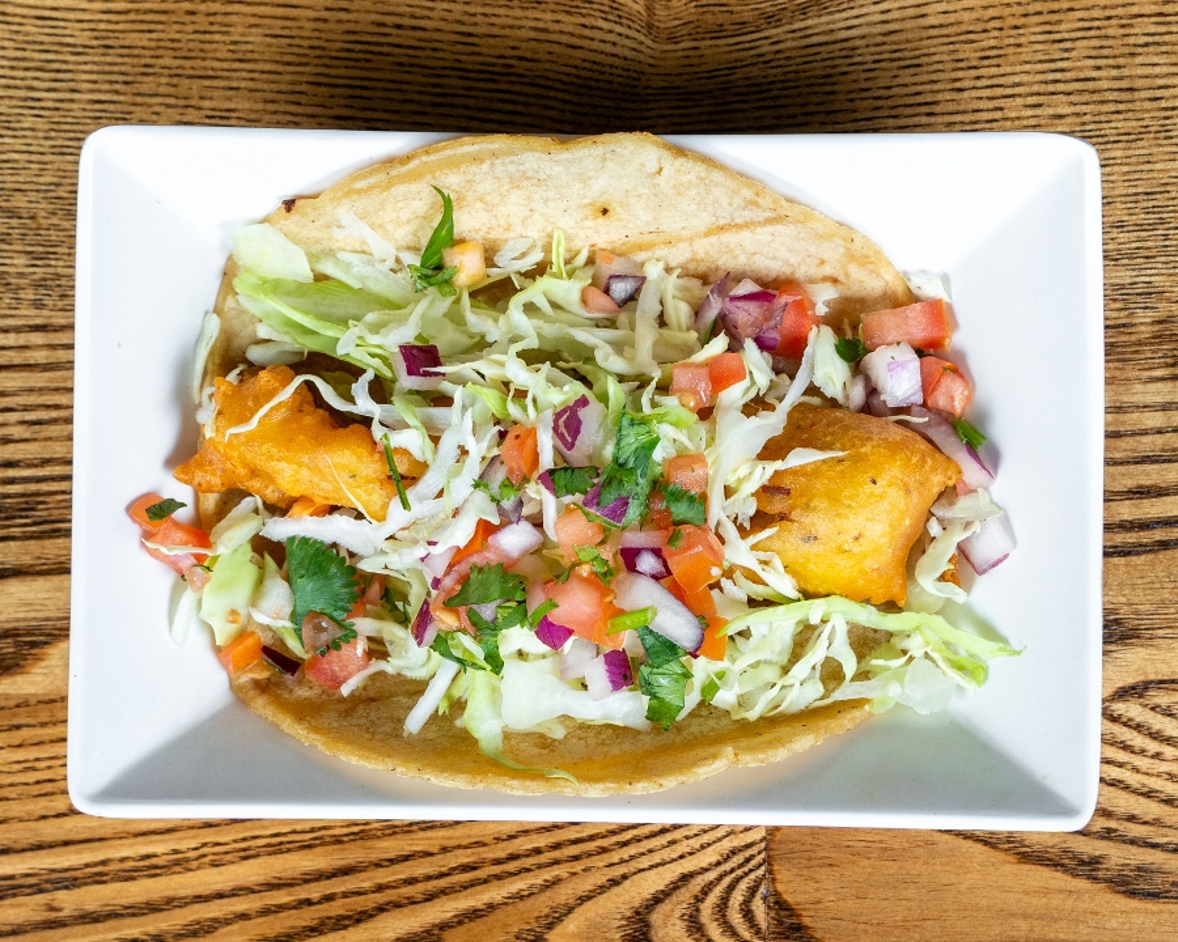 2 Battered Fish Tacos.