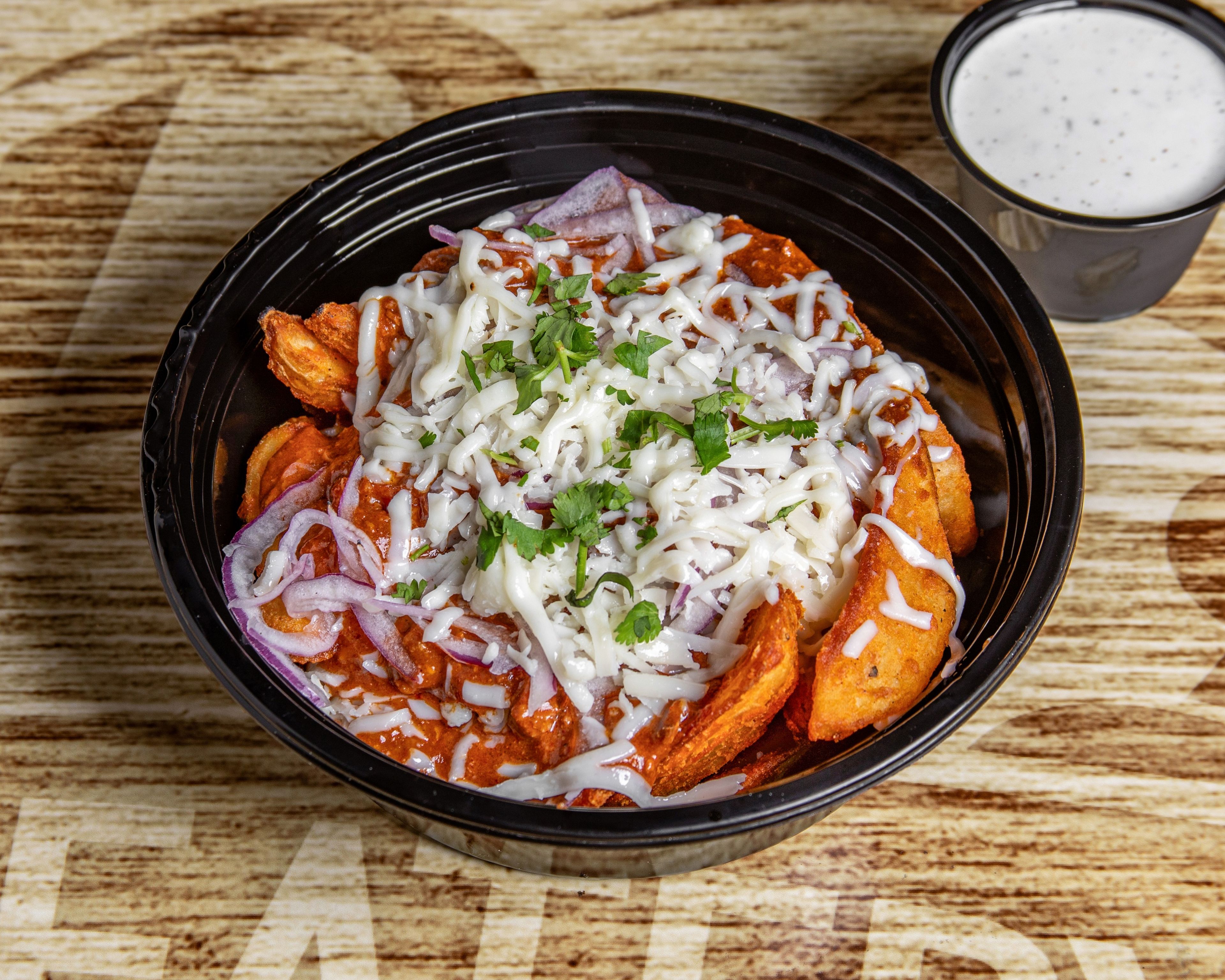 CHILI CHEESE POTATOES.