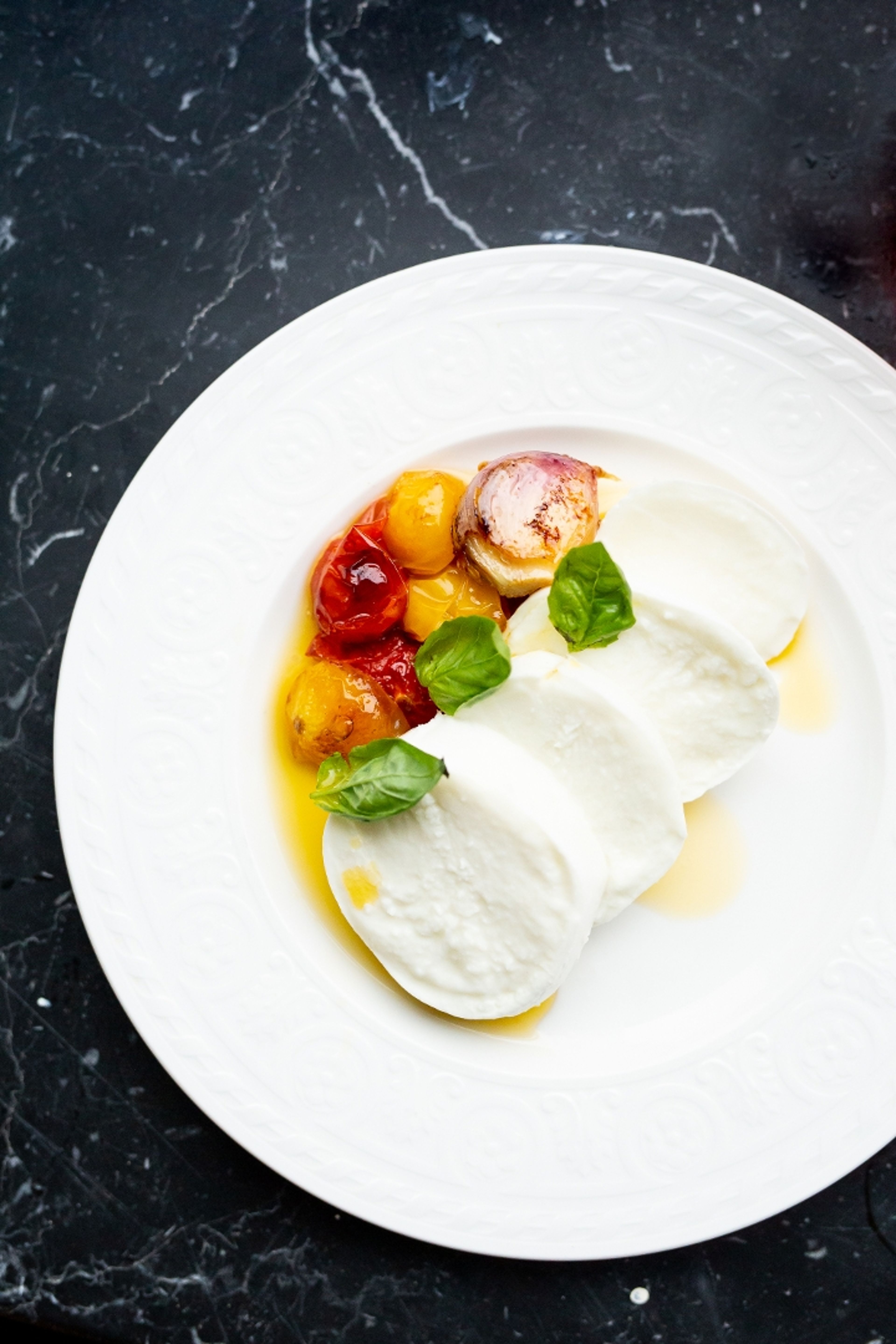 HAND STRETCHED MOZZARELLA & CONFIT HEIRLOOMS.