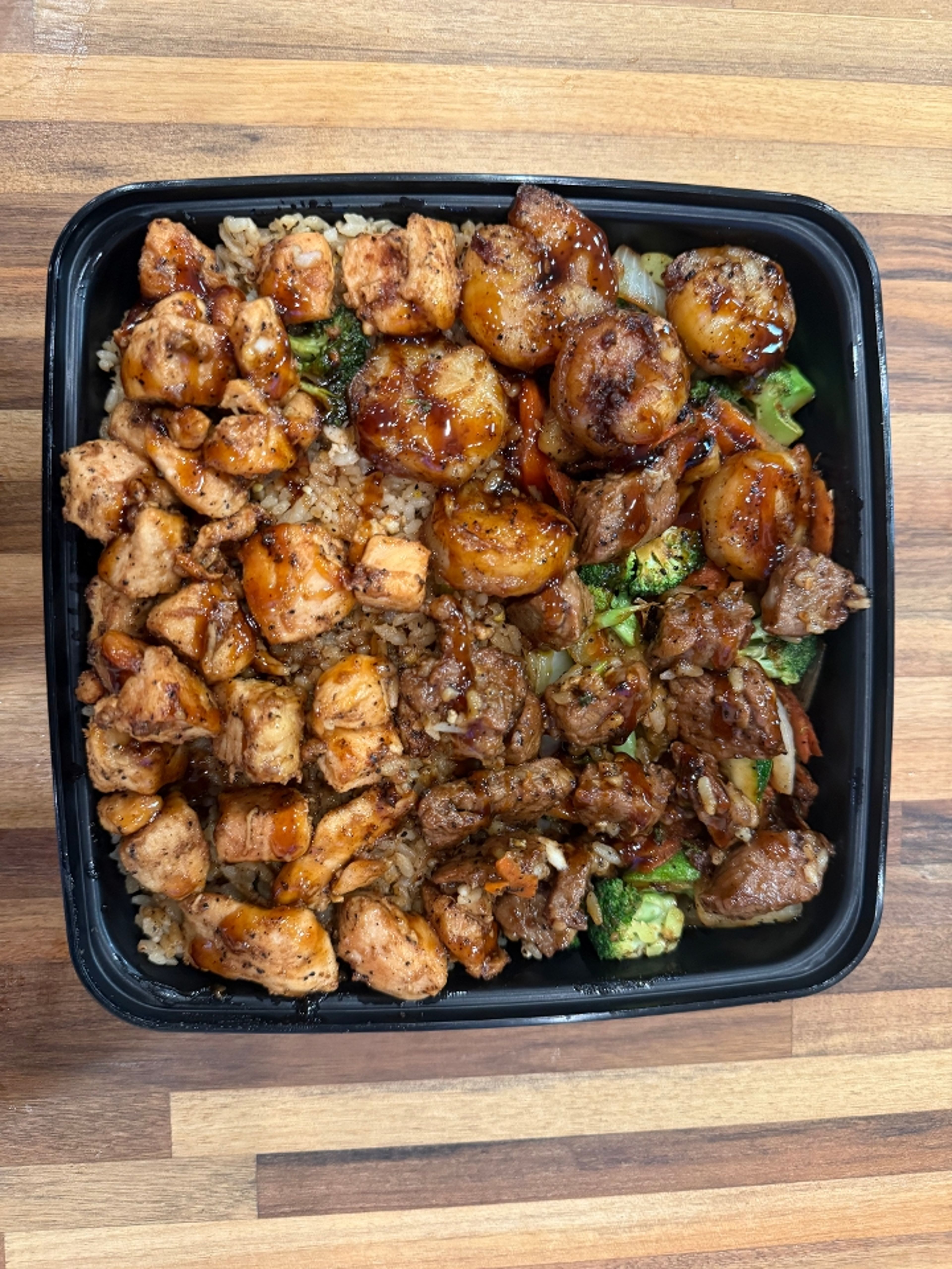 Chicken, Steak, Shrimp Trio Bowl.