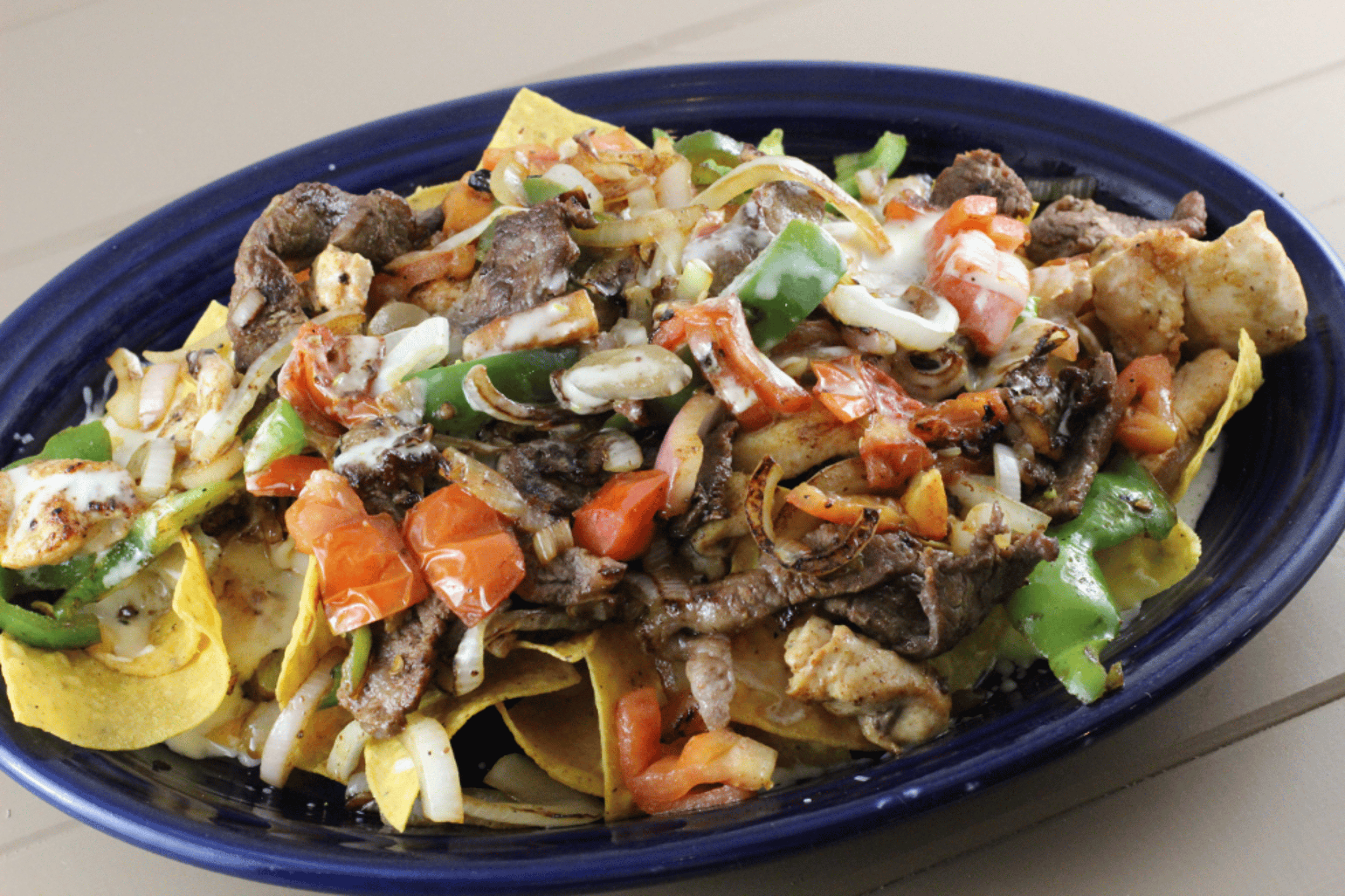 (H) Nachos Fajita Chicken.