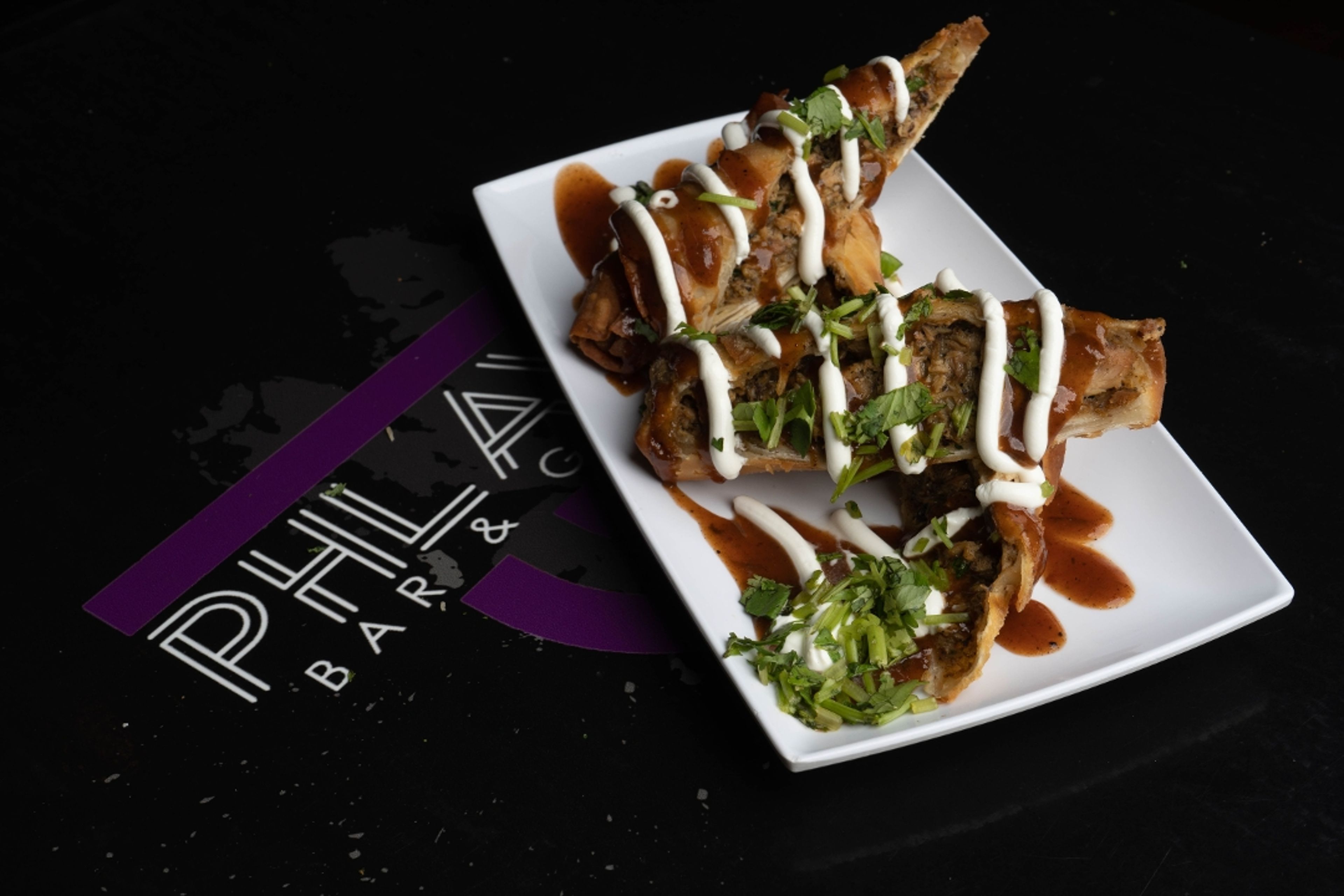 Jerk Chicken Egg Rolls.