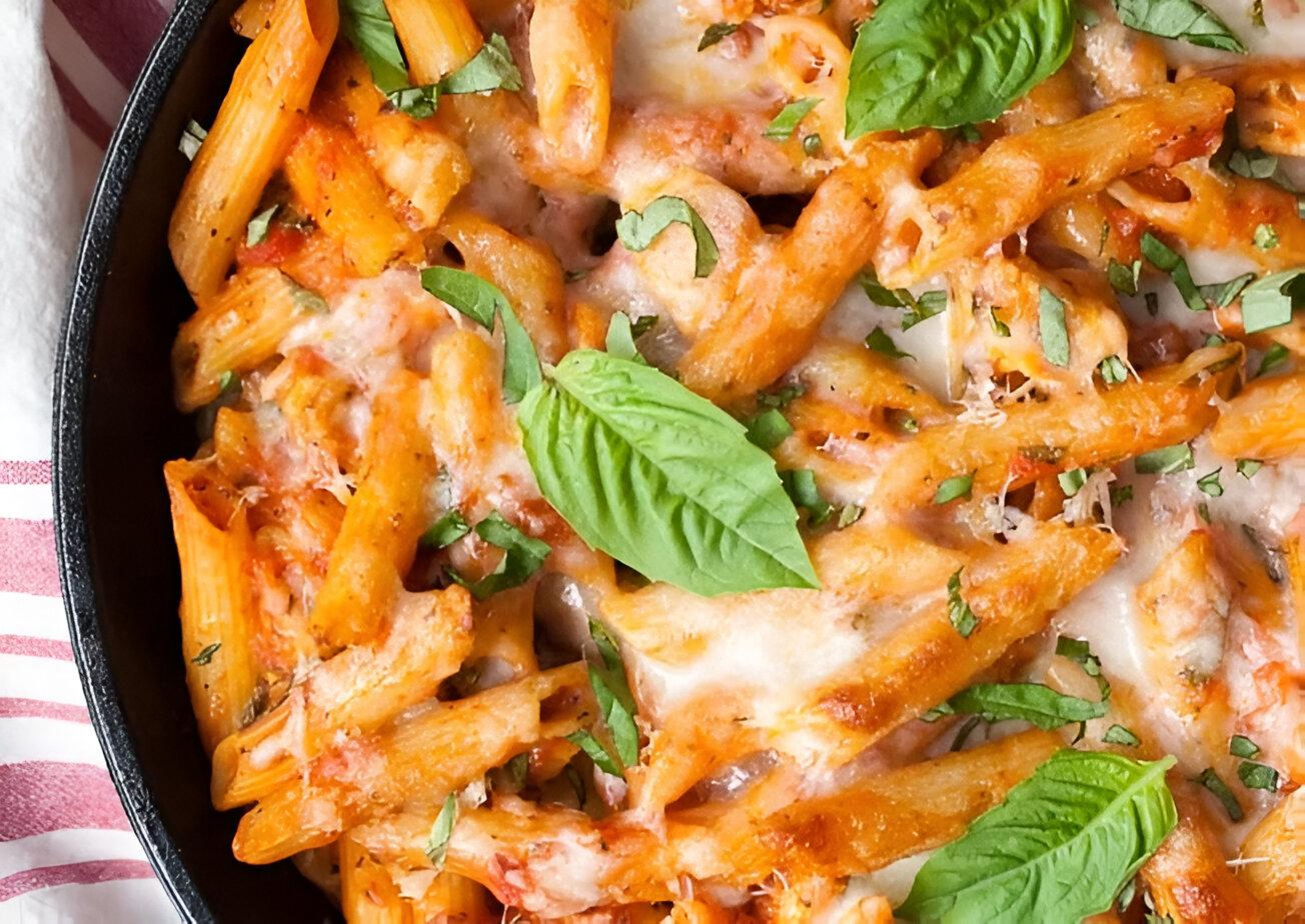 Ziti with chicken cutlet marinara.