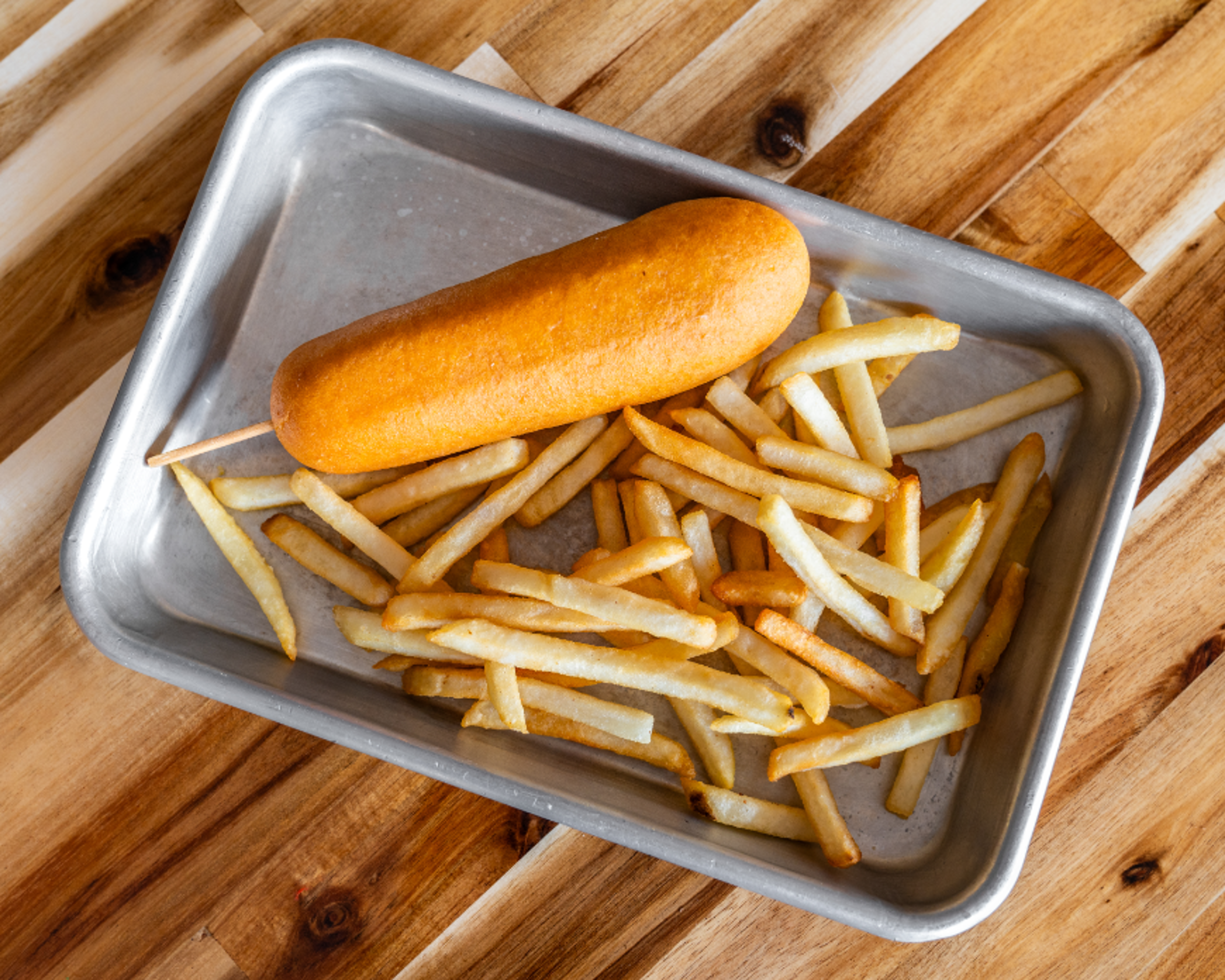 Kids Corn dog with cheese fries.
