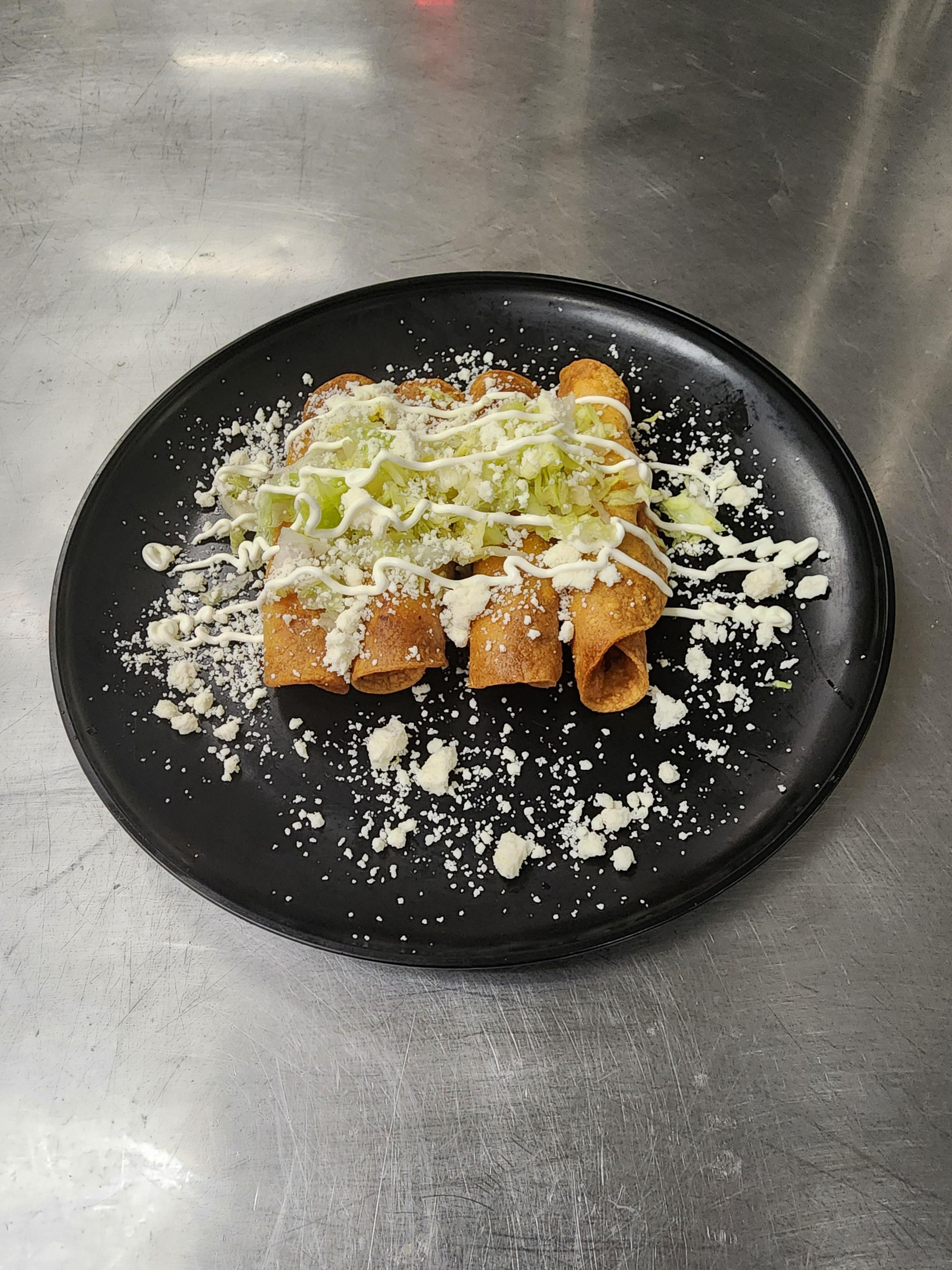 4 chickens  taquitos.