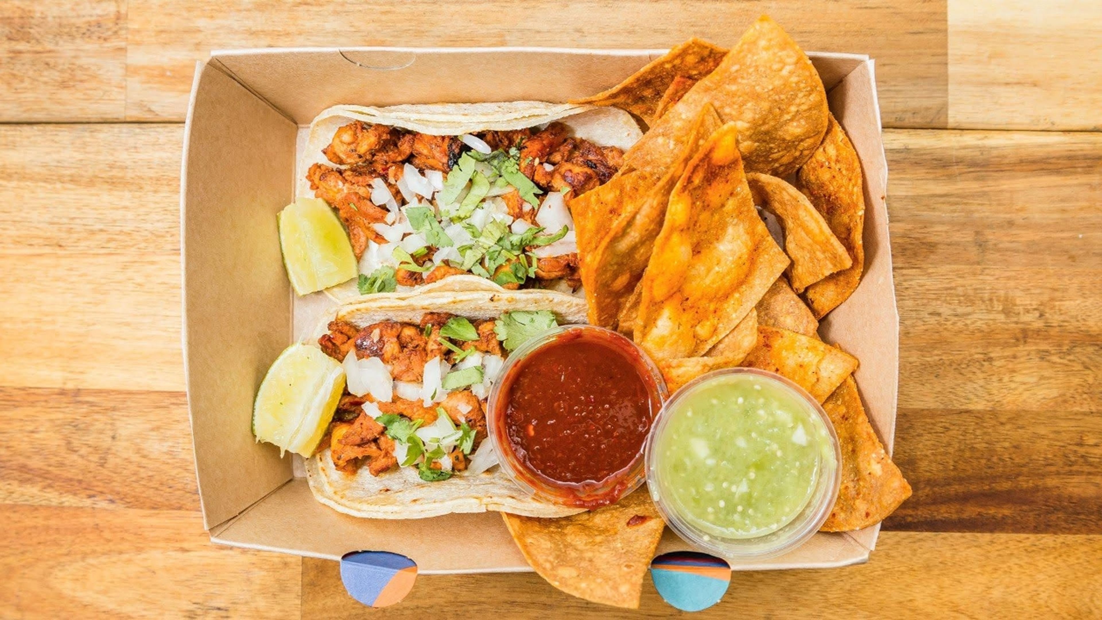Two Tacos (Onion, Cilantro & Lime) + Tortilla Chips + Salsa.
