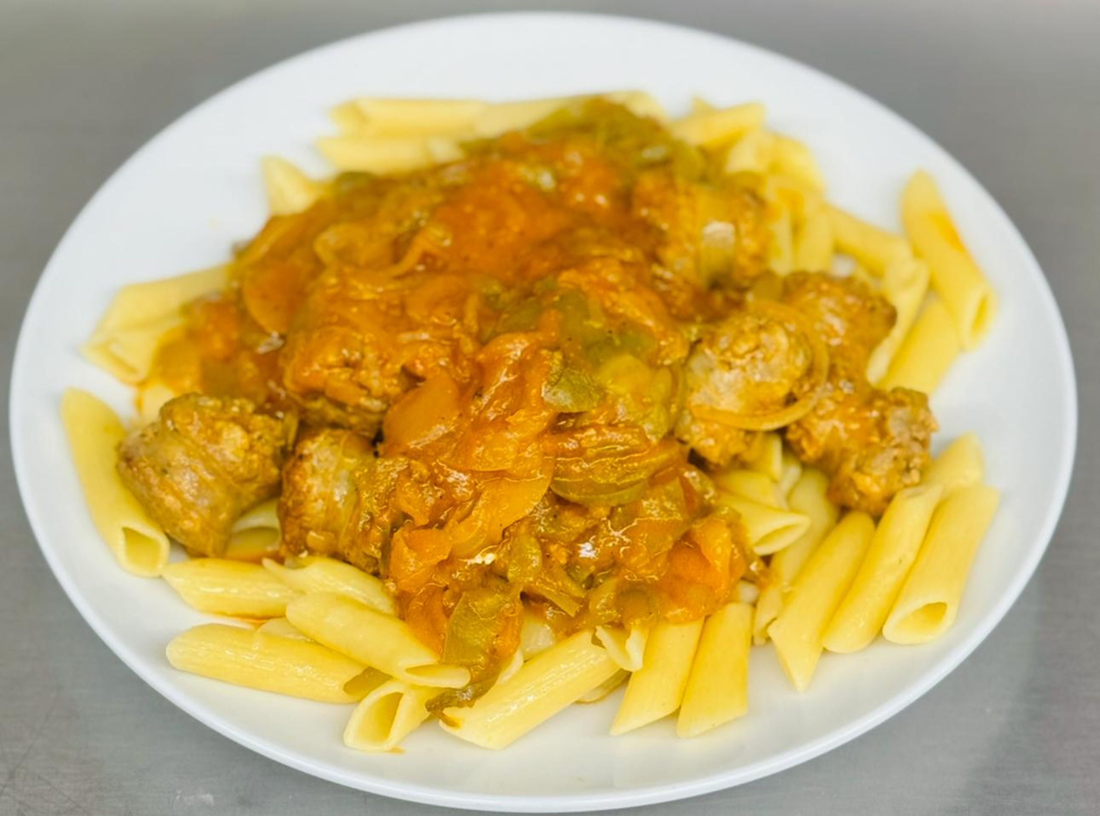 SAUSAGE & PEPPERS OVER ZITI.