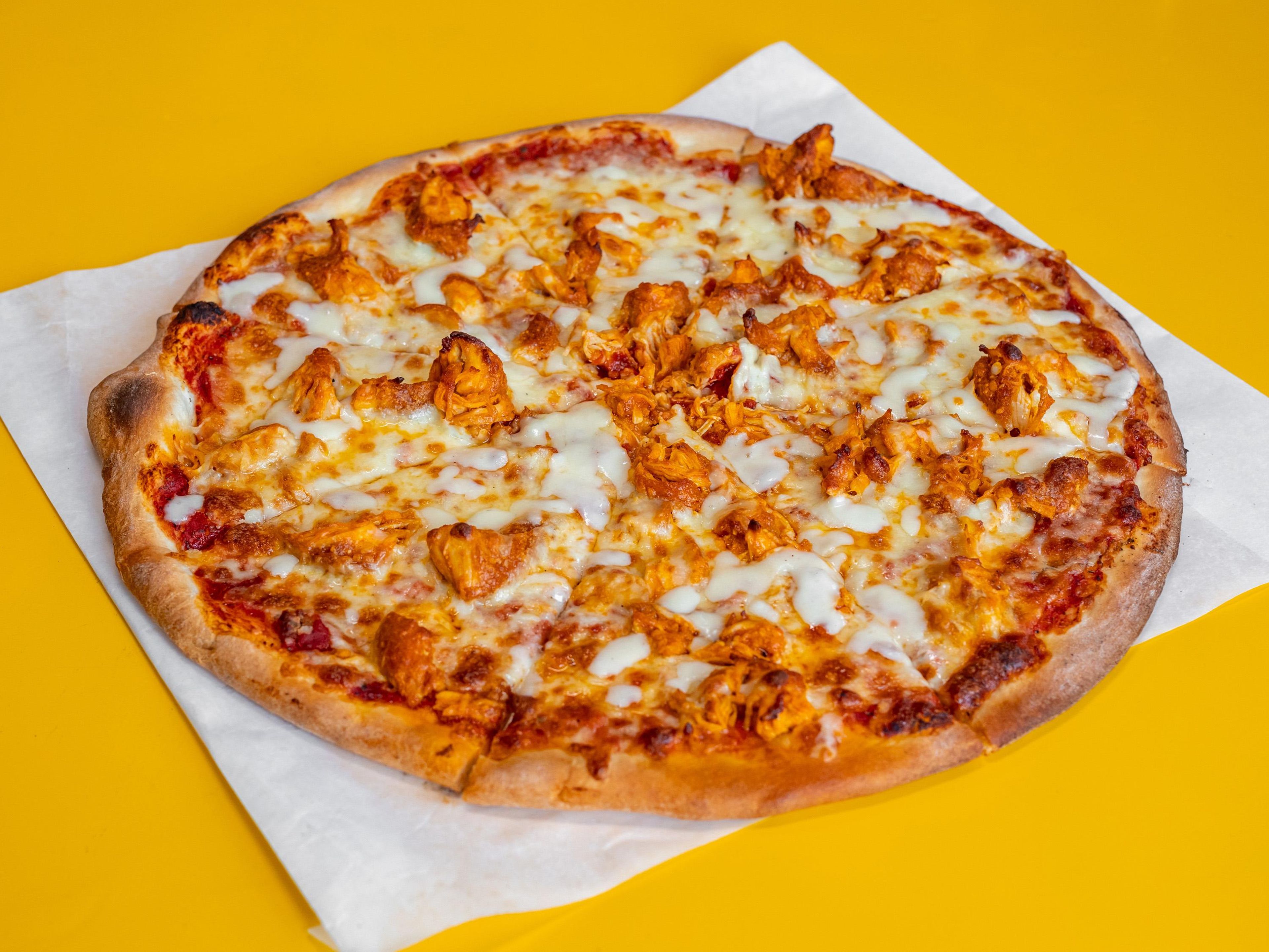 Buffalo supreme pizza medium.