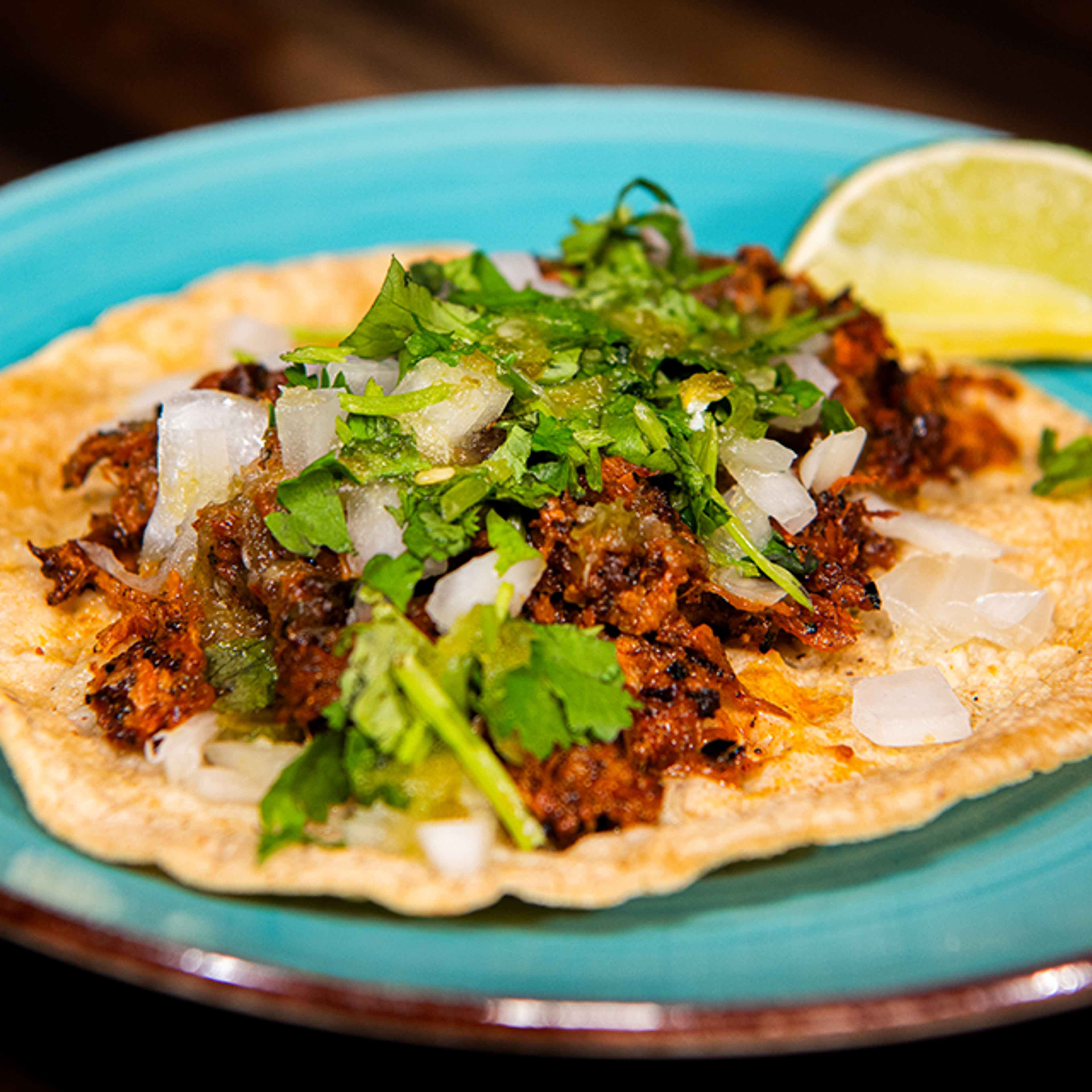 Al Pastor Pulled Pork Taco.