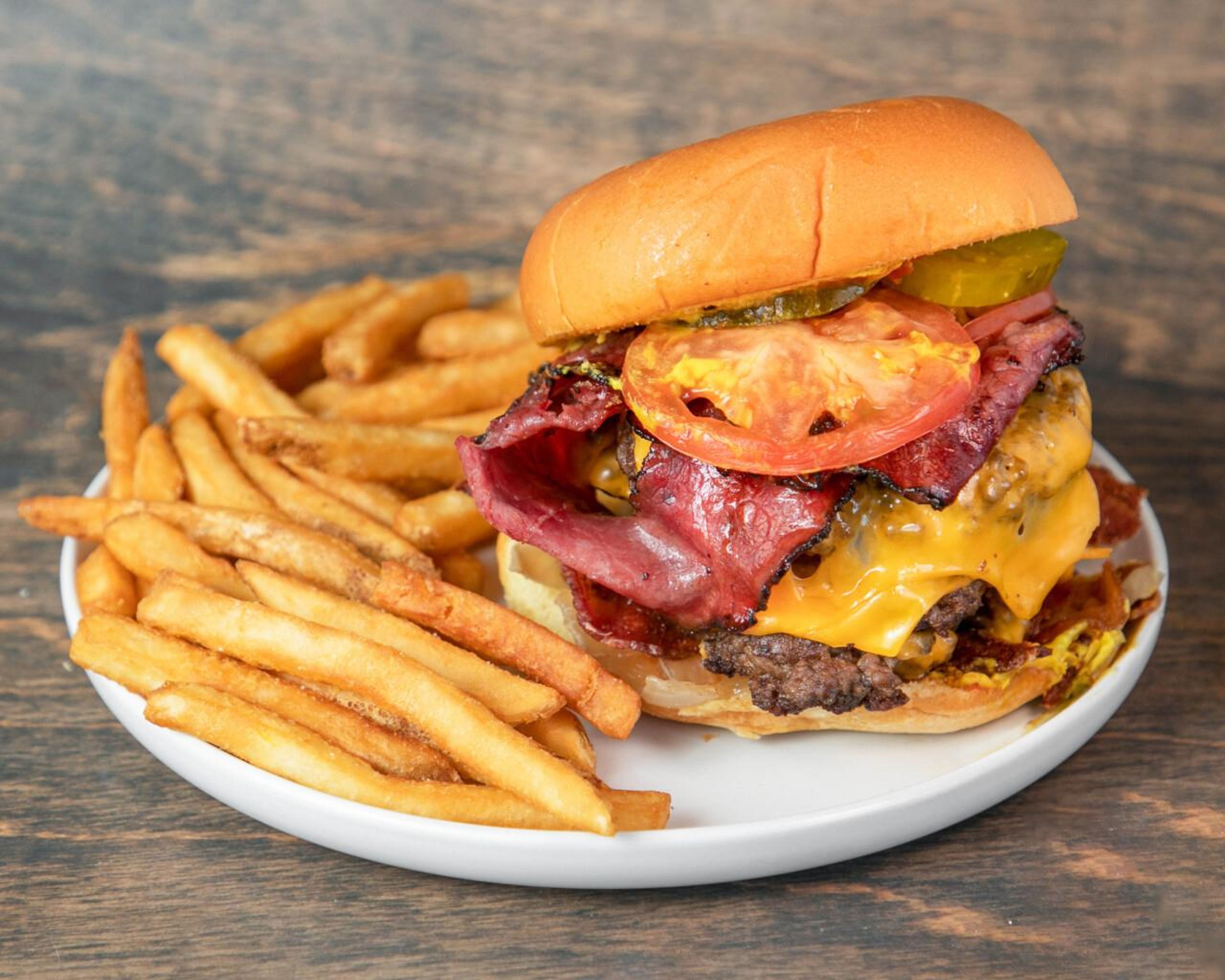 Pastrami Cheeseburger with Fries.