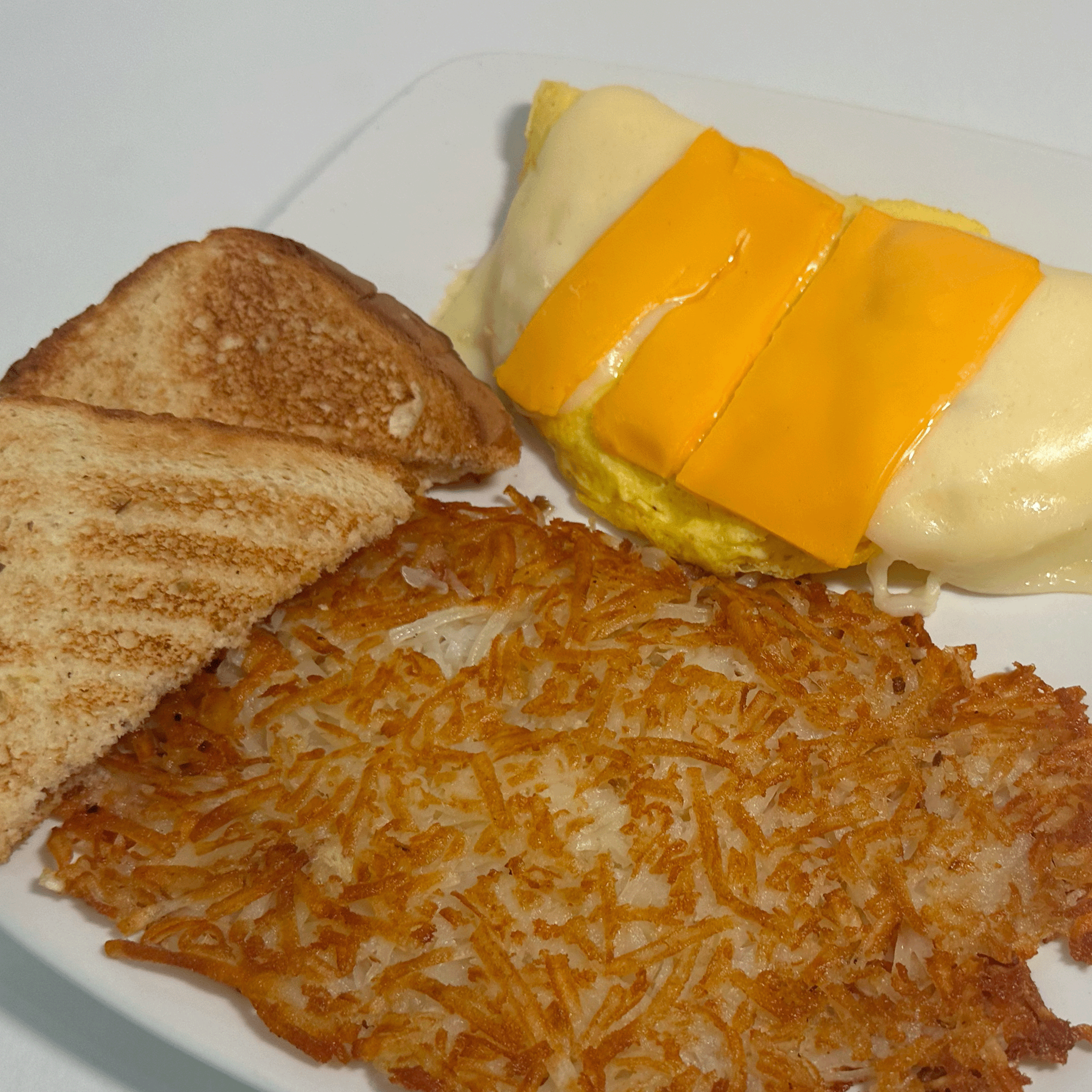 THREE CHEESE OMELET.