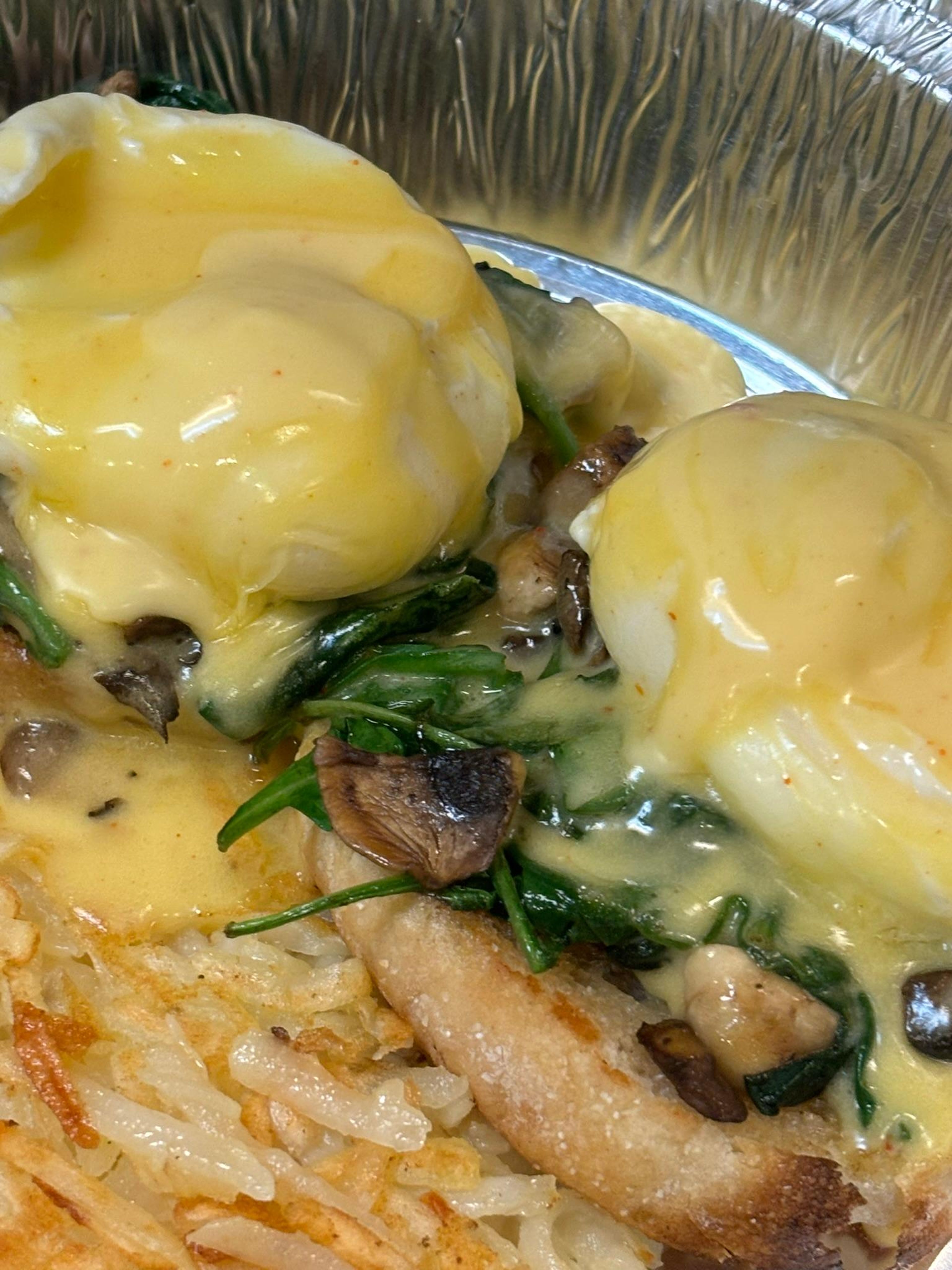Baby Spinach and Sauteed Mushroom Benedict.
