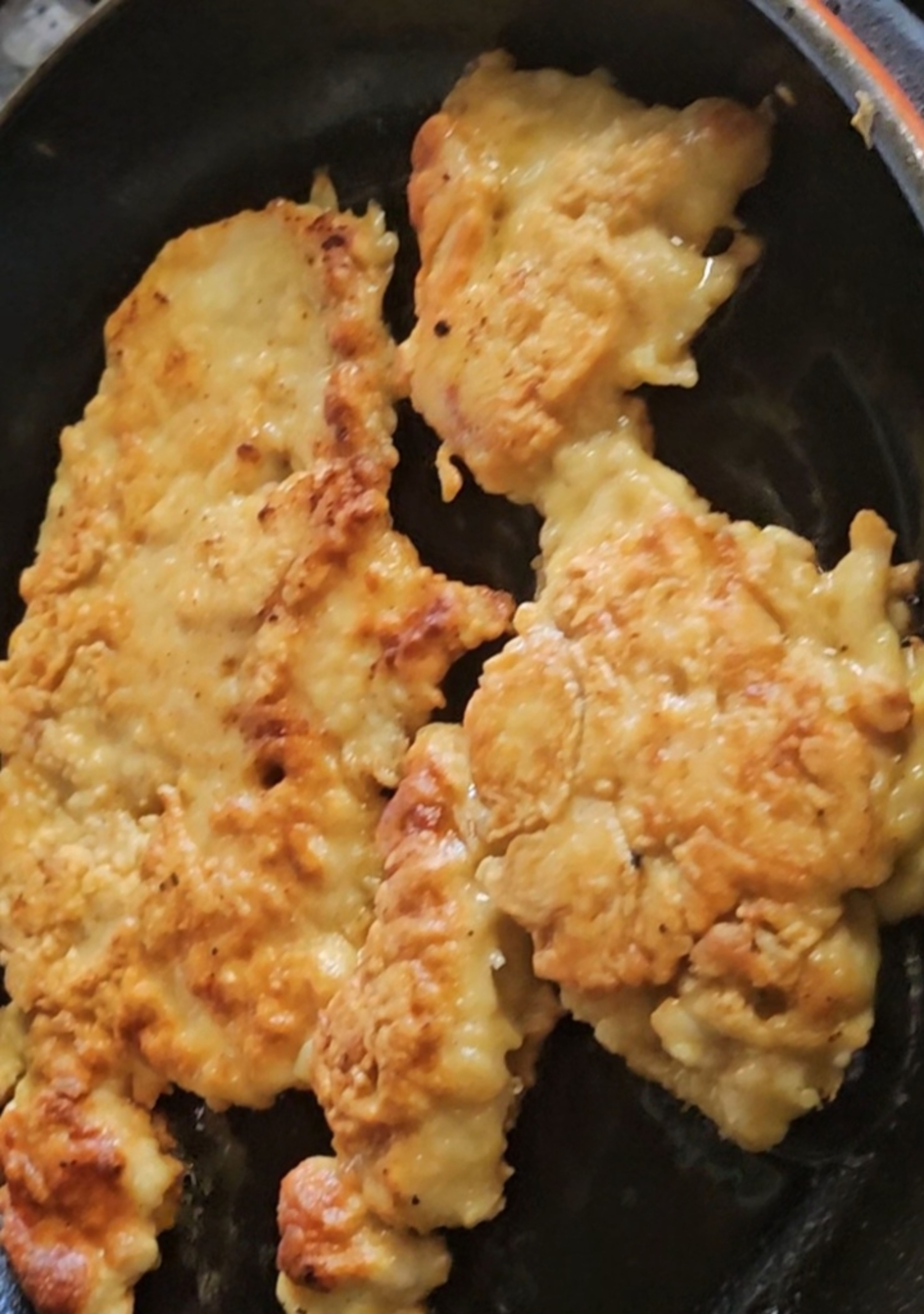 Pollo a la Milanesa / Breaded chicken breast.