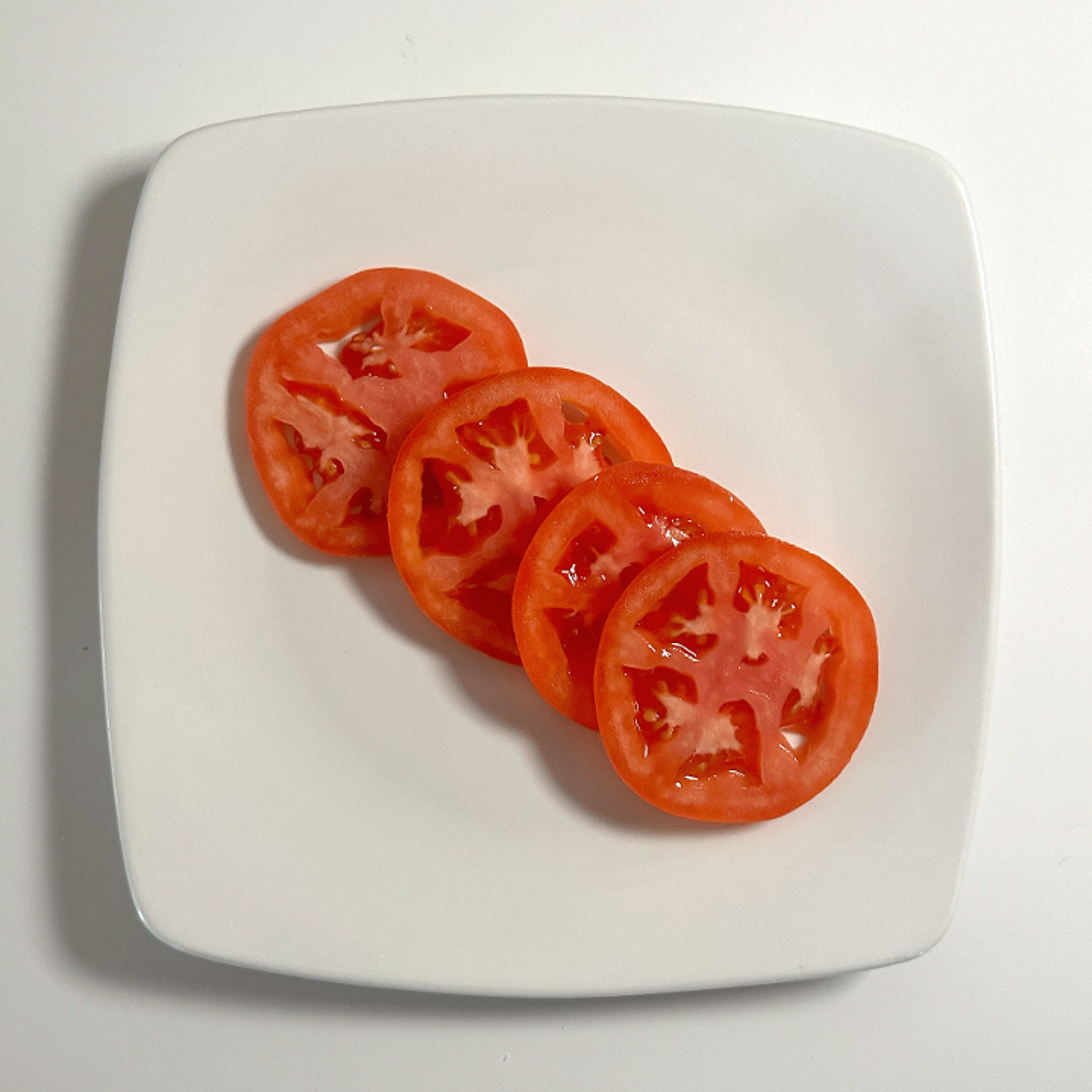 SLICED TOMATOES.