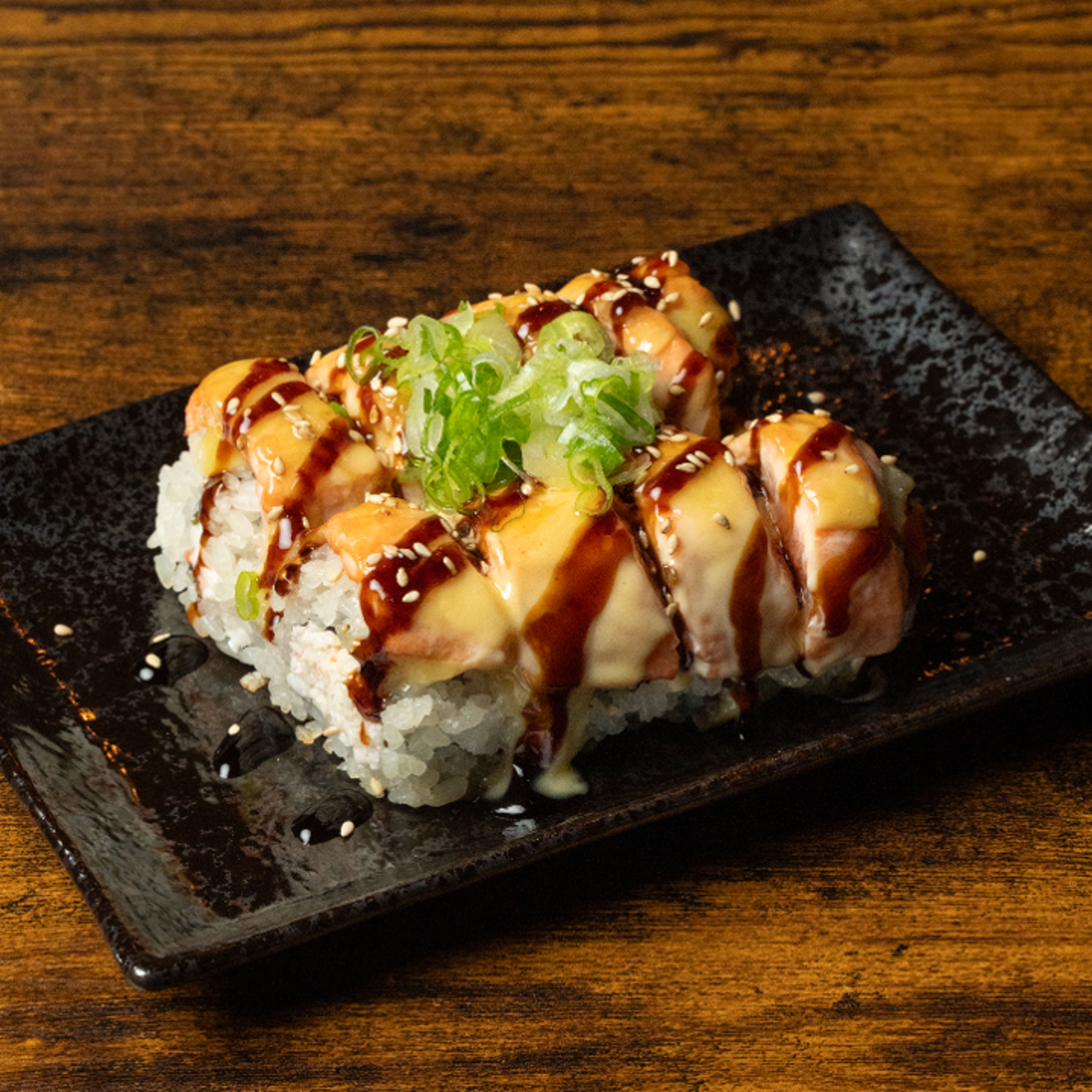 BAKED SALMON ROLL* 8PC.