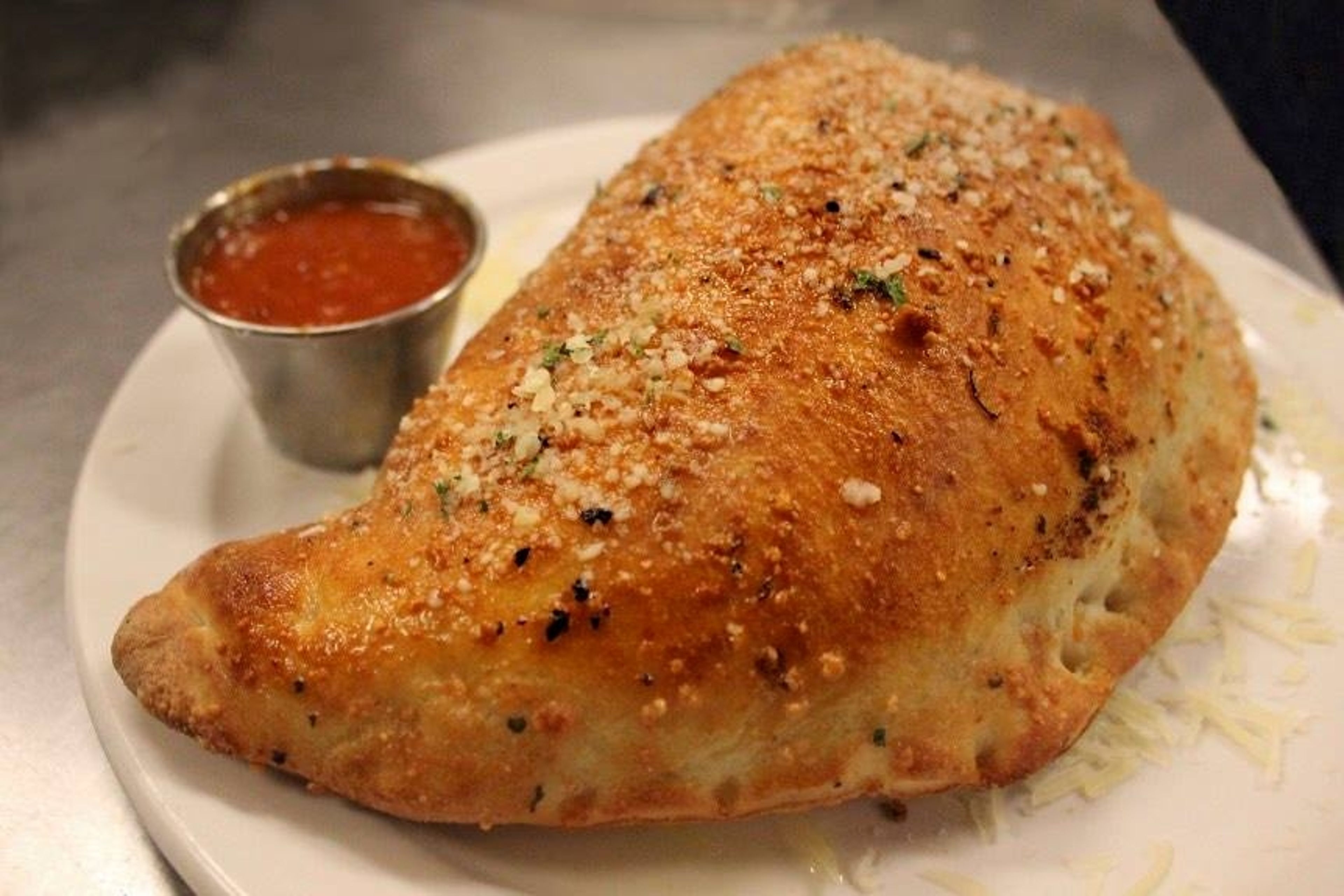 Calzone (includes Mozz and Ricotta Cheese).