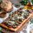 Mushroom Truffle Flatbread (Tomato Sauce, mushrooms, parmesan, truffle oil, herbs)