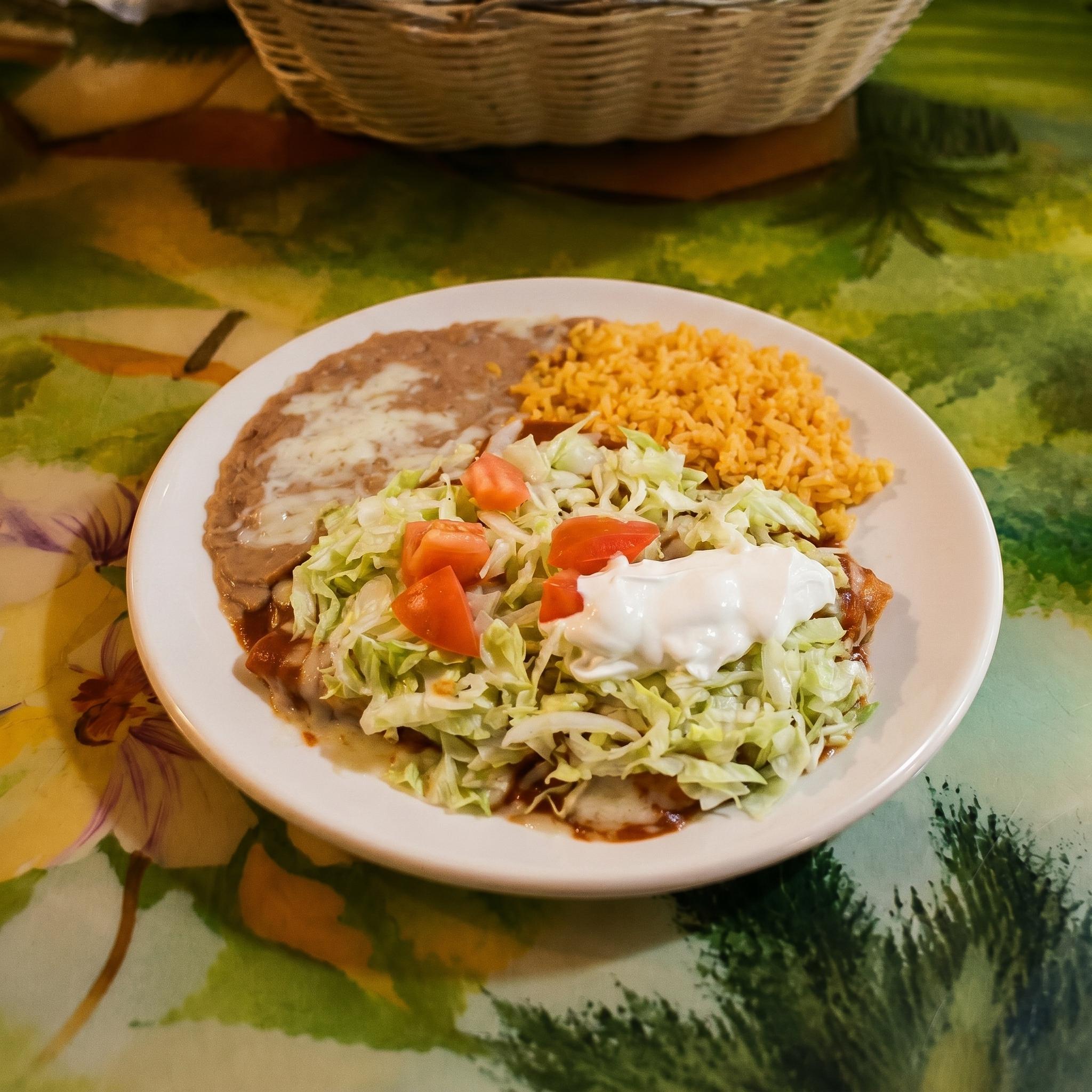 G. Two Beef Enchiladas, One Tamale and One Beef Taco.