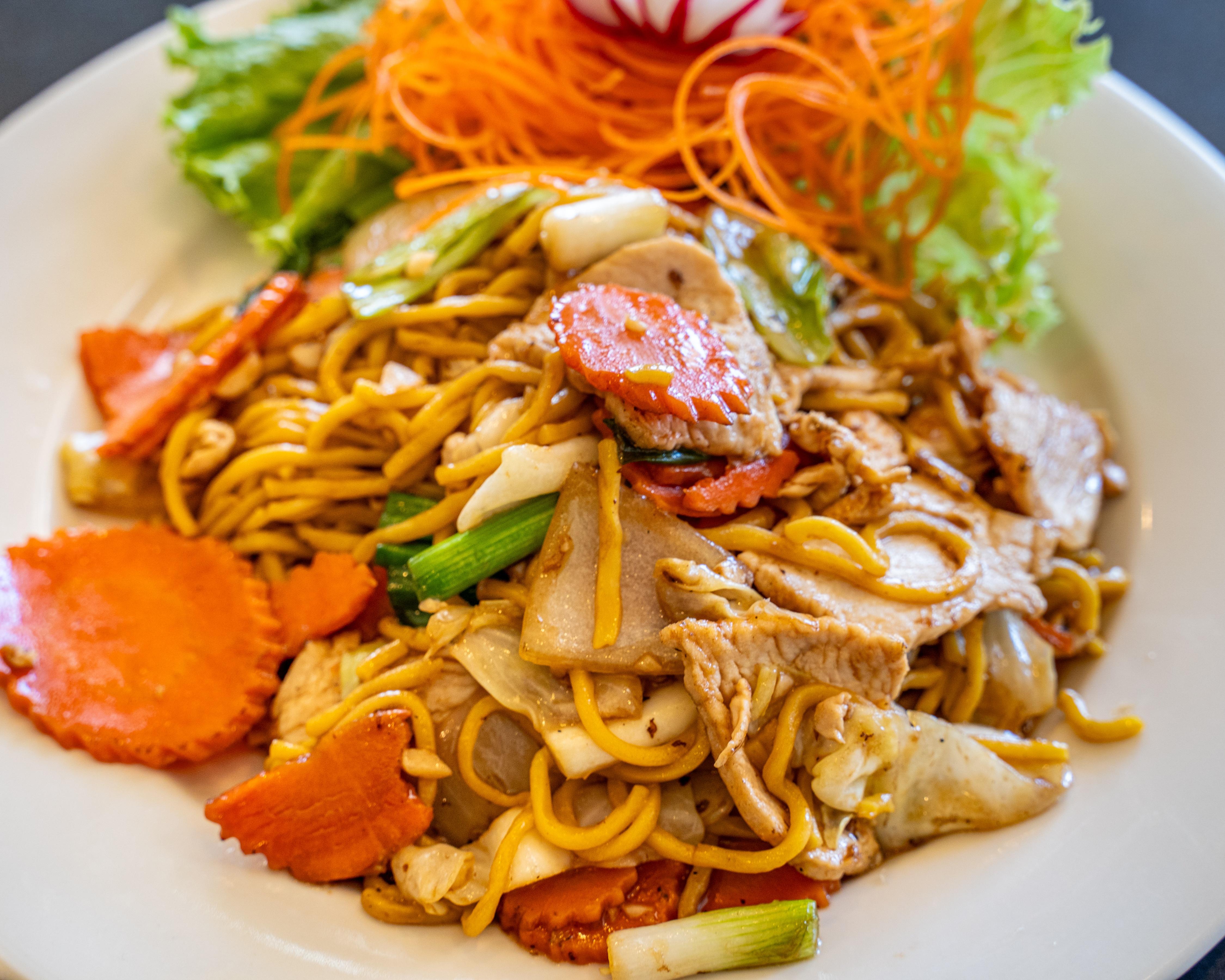 Pad Lo Mein Noodles served with 1 Crispy Veg Roll.