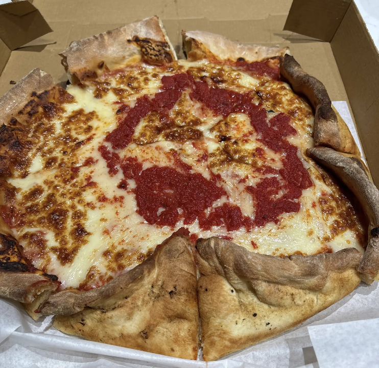 Medium deep dish (4 toppings ).