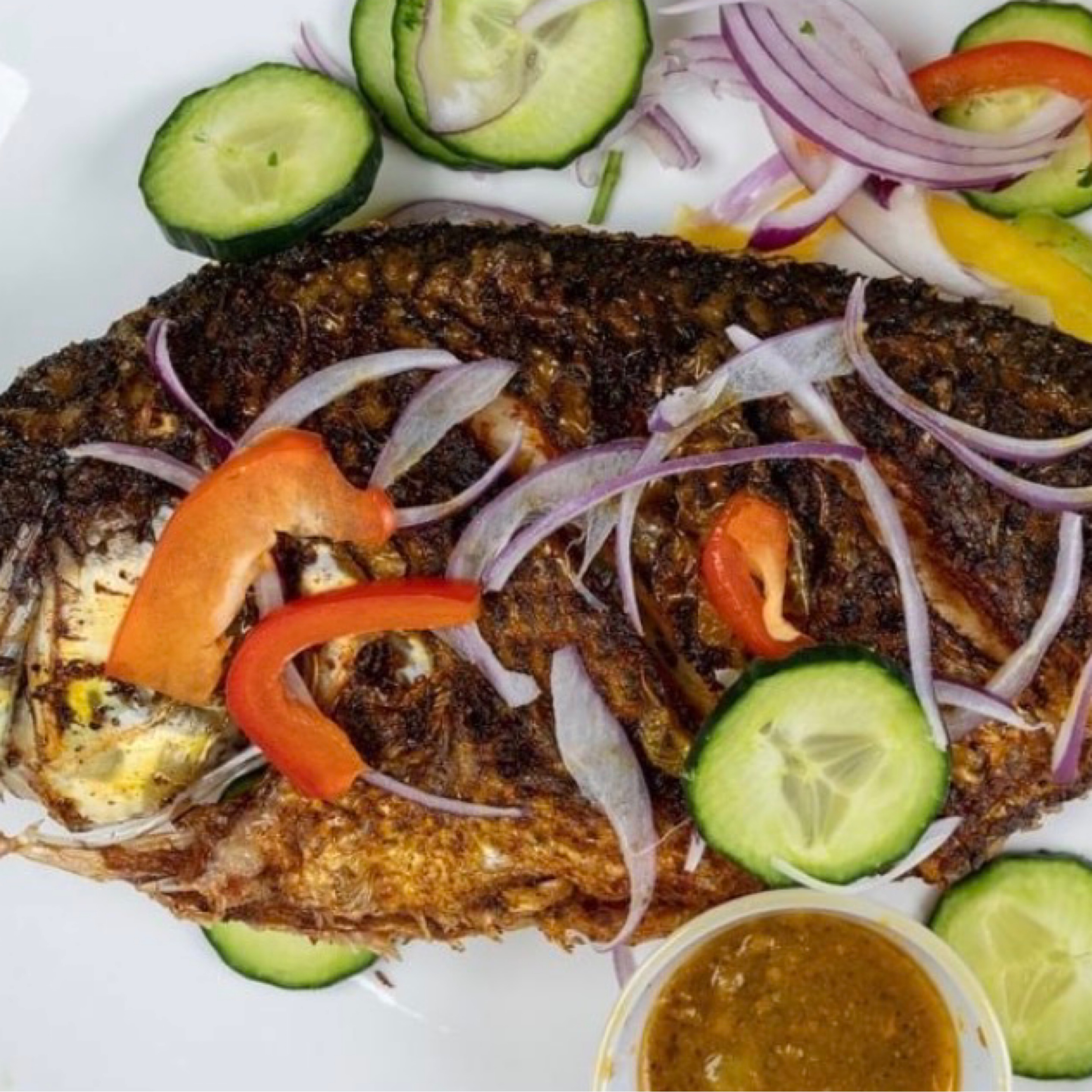Fish (Bone in Whole Fish) with Rice and Salad.