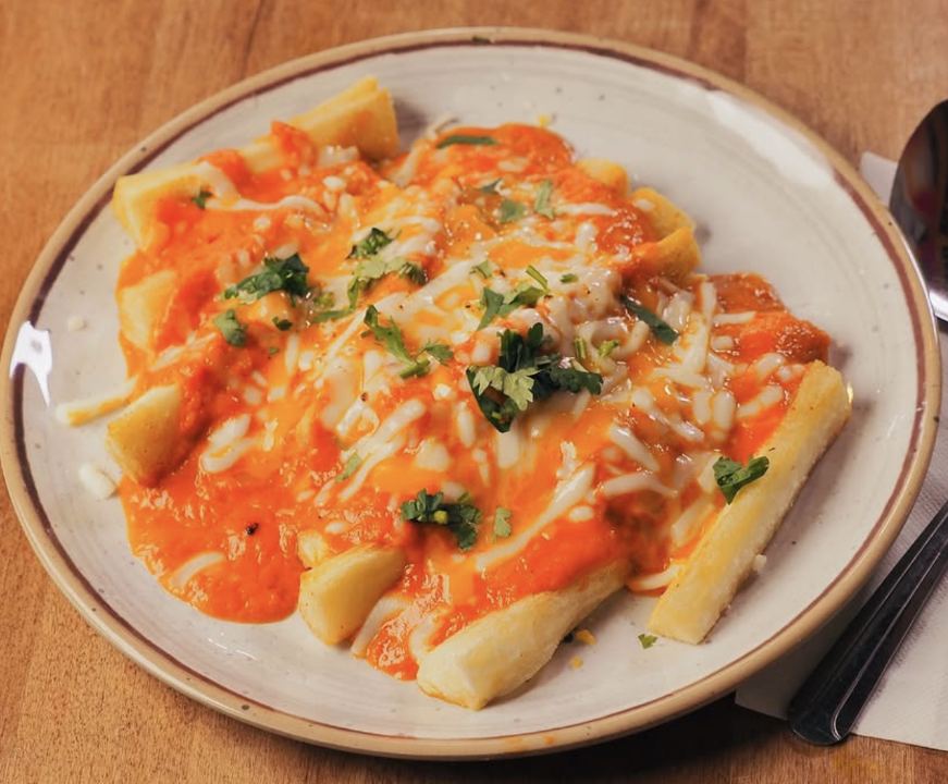 Cheesy Tikka Masala Yuca Fries.