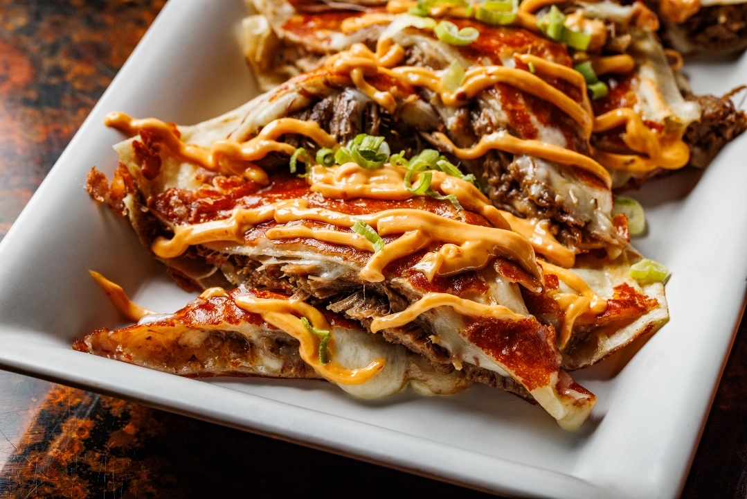 *MARINATED SHORT RIB QUESADILLA.